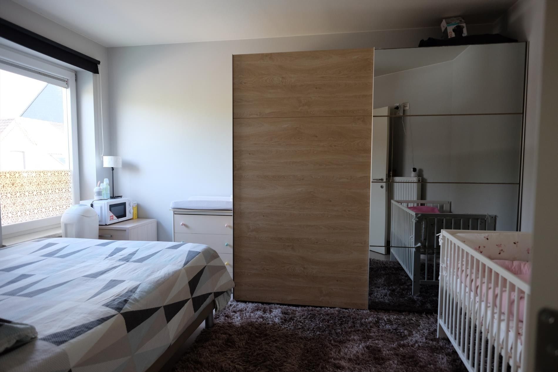 Recente rijwoning met garage foto 9