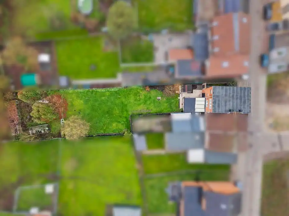 HALFOPEN BEBOUWING MET GARAGE EN GROTE TUIN IN TONGEREN foto 2