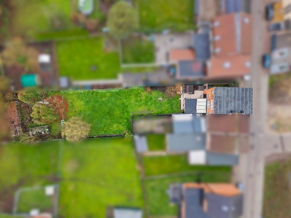 HALFOPEN BEBOUWING MET GARAGE EN GROTE TUIN IN TONGEREN foto 2