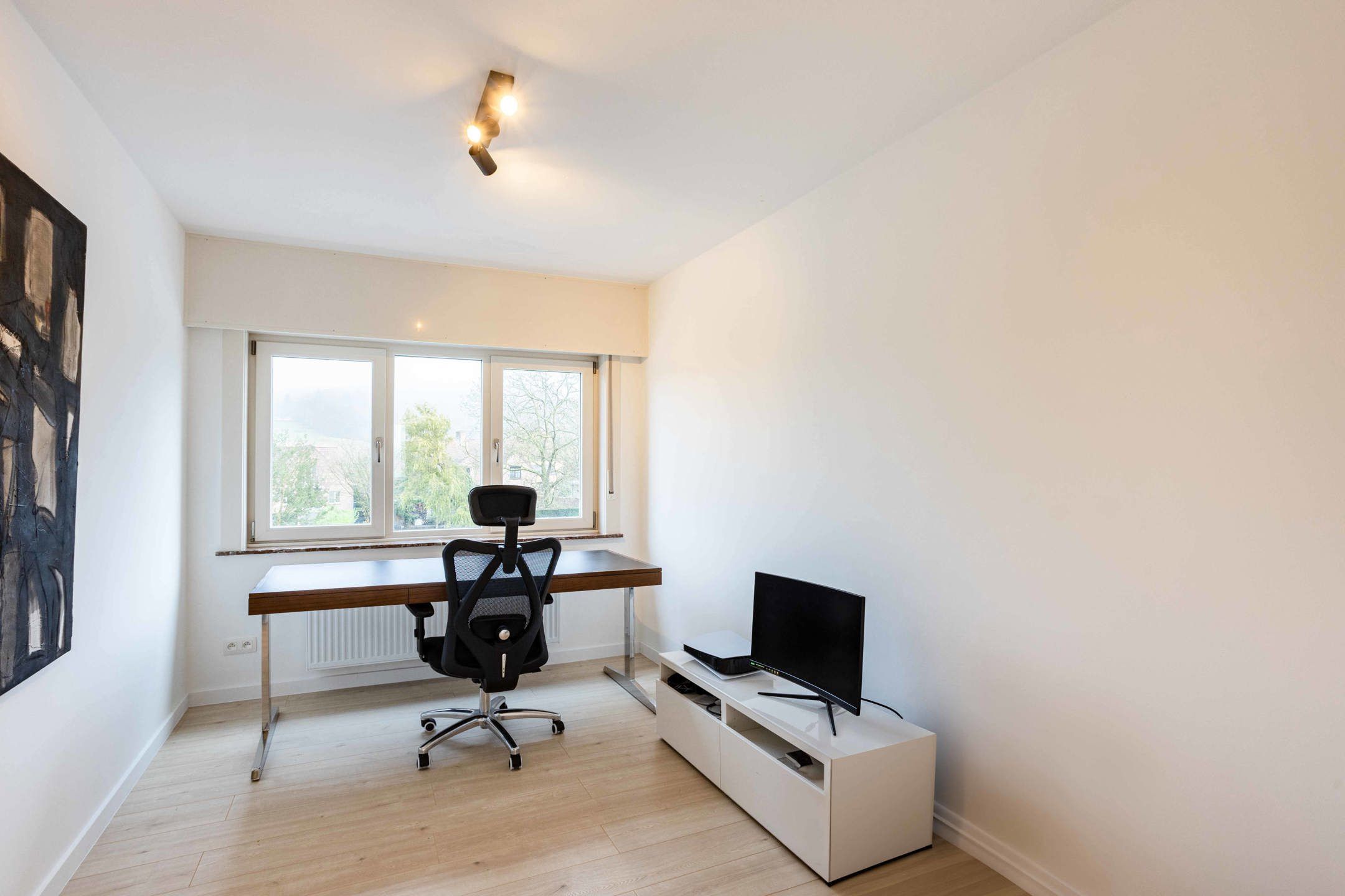 Kwalitatief gerenoveerde driegevelwoning met tuin foto 18