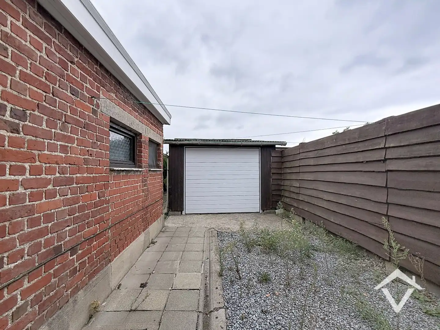 Alleenstaande woning met twee slaapkamers, tuin en garage te Roeselare foto 20
