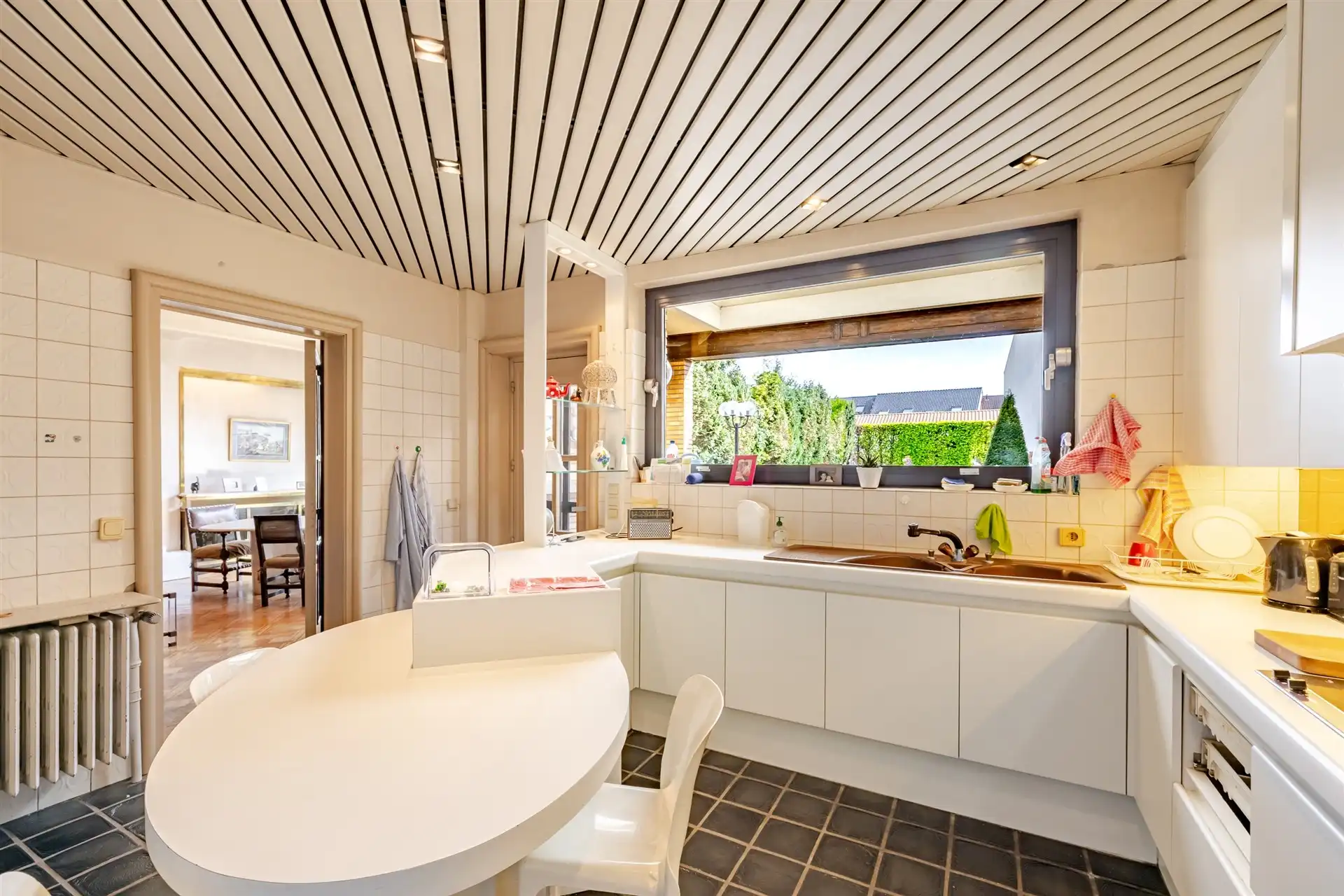 Karaktervolle herenwoning met indrukwekkende ruimte, authentieke elementen en rustige tuin nabij het stadspark foto 7