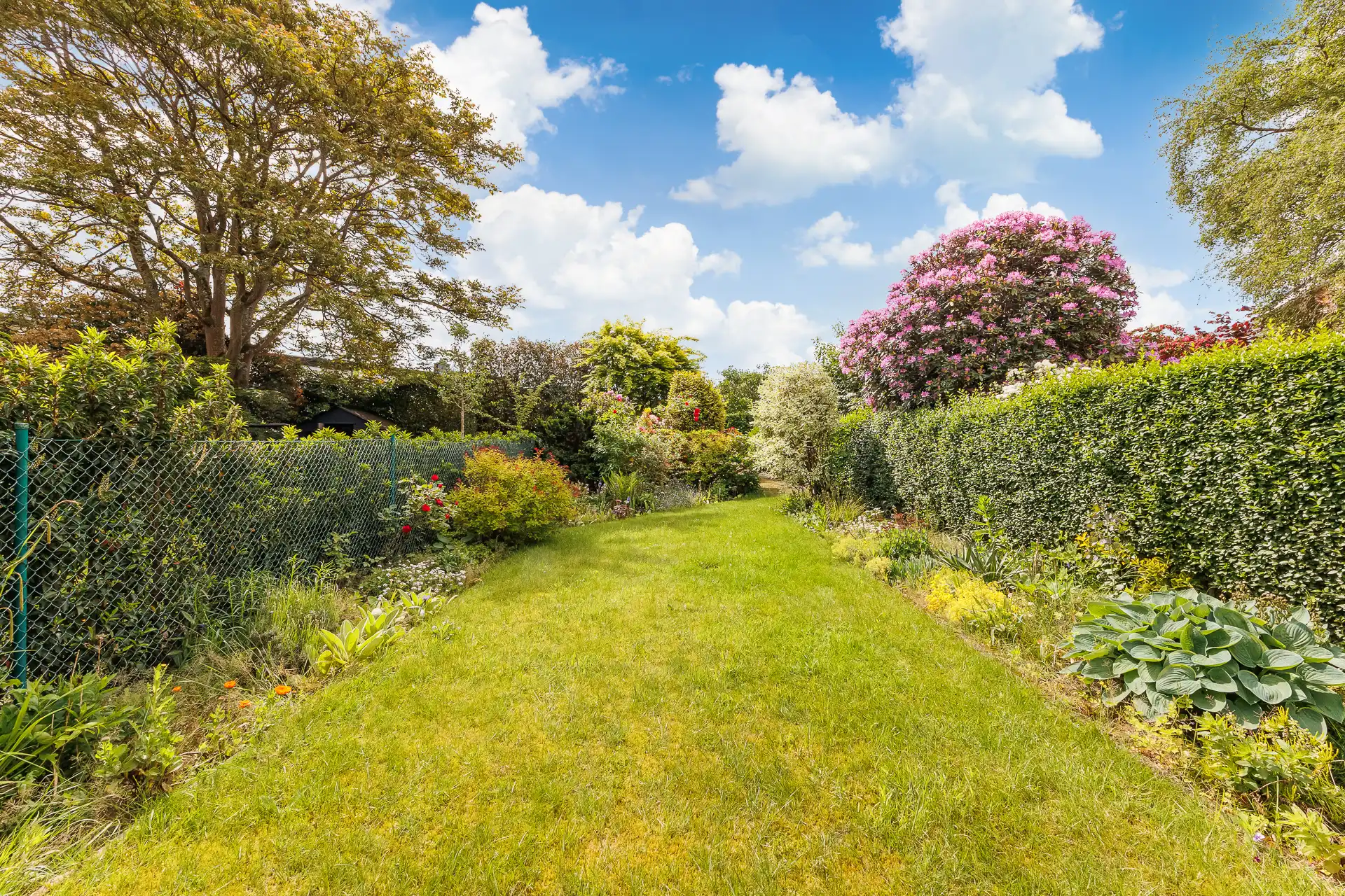 Prachtige woning met zuidgeoriënteerde tuin op toplocatie! foto 4