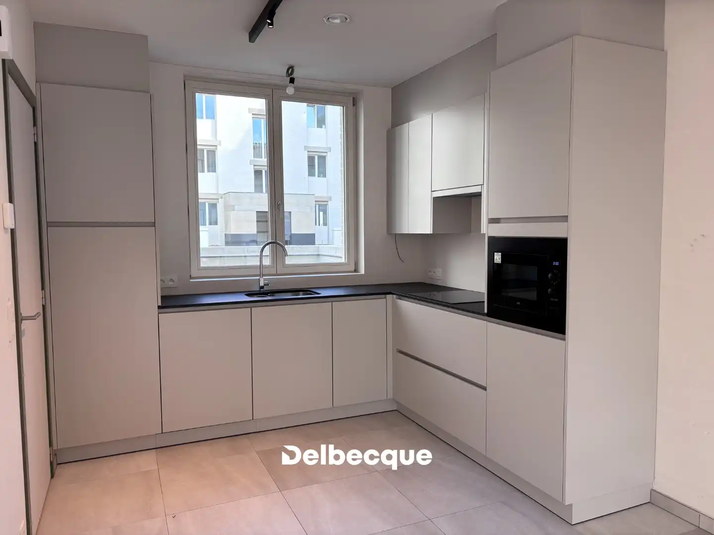 Lichtrijke nieuwbouwwoning met 3 slaapkamers, tuin en ondergrondse staanplaats foto 6