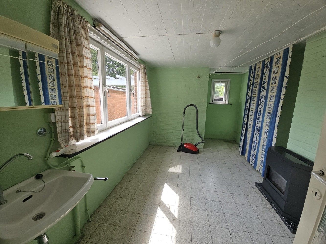 Karaktervolle driegevelwoning met tuin en garage foto 17