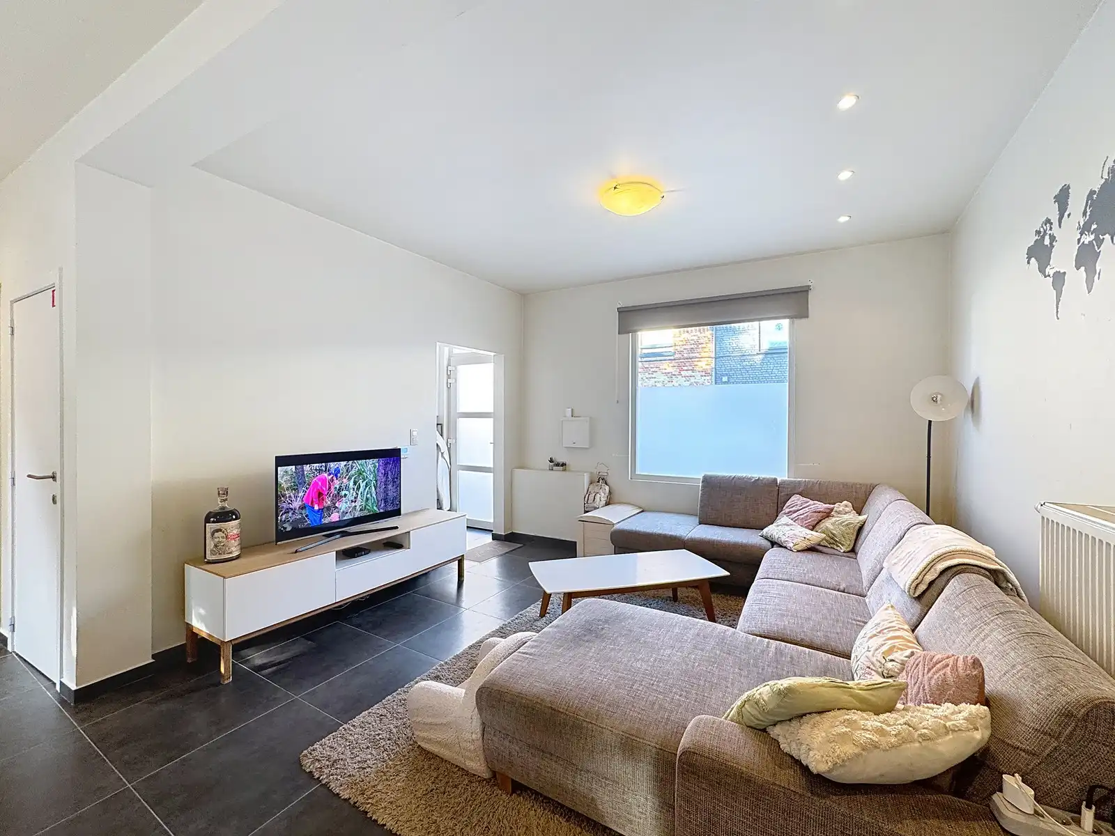 Instapklare stadswoning met 3 ruime slpk en zonnig terras! foto 2