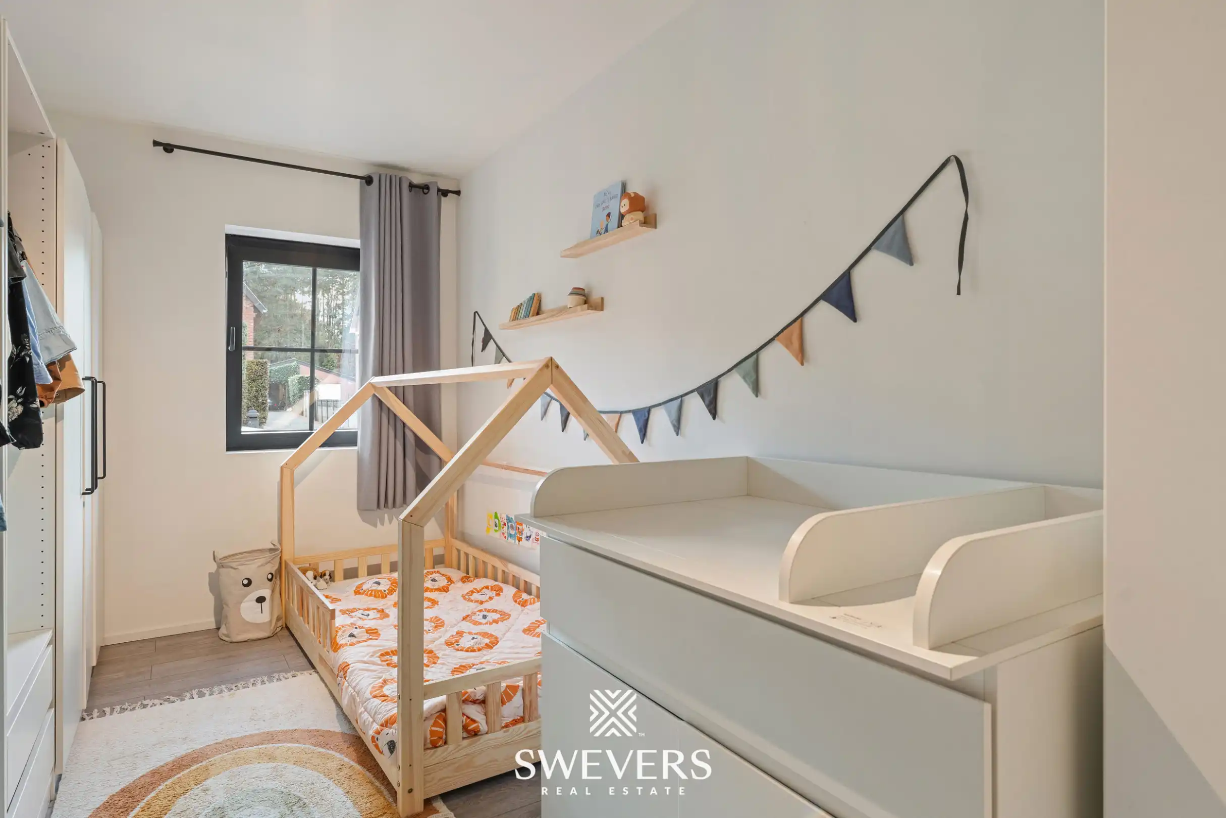 Instapklaar gelijkvloers 2 slpk-appartement met terras en tuin in Heusden. foto 18