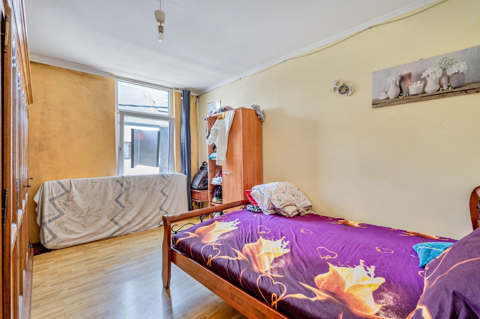 Te renoveren woning met stadskoer foto 7