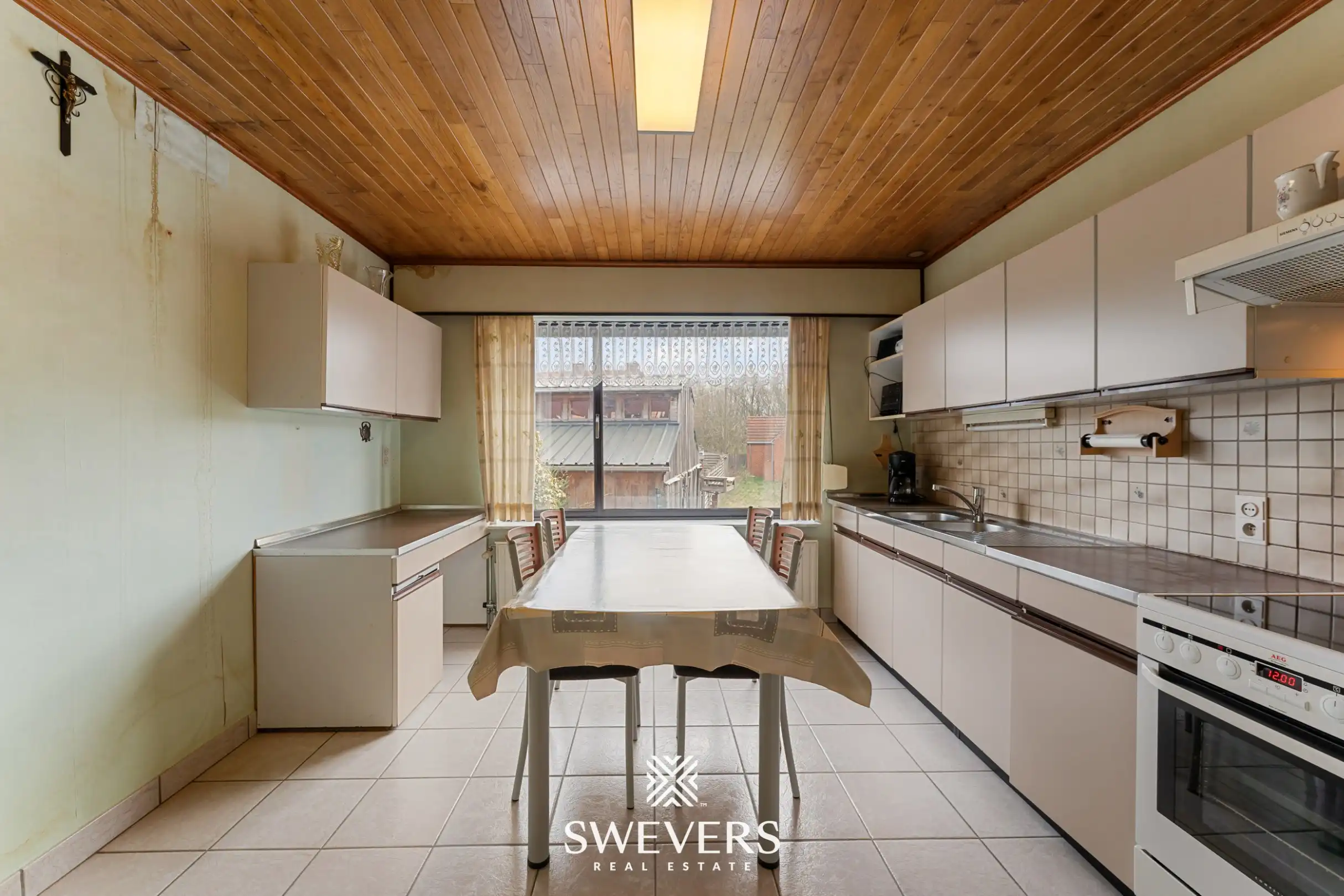 Charmante renovatiewoning met stevige structuur en veel potentieel in Koersel foto 11