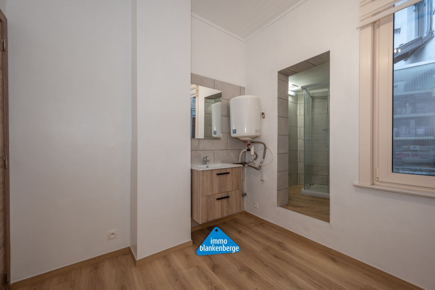 Volledig gerenoveerde rijwoning met één slaapkamer foto 10