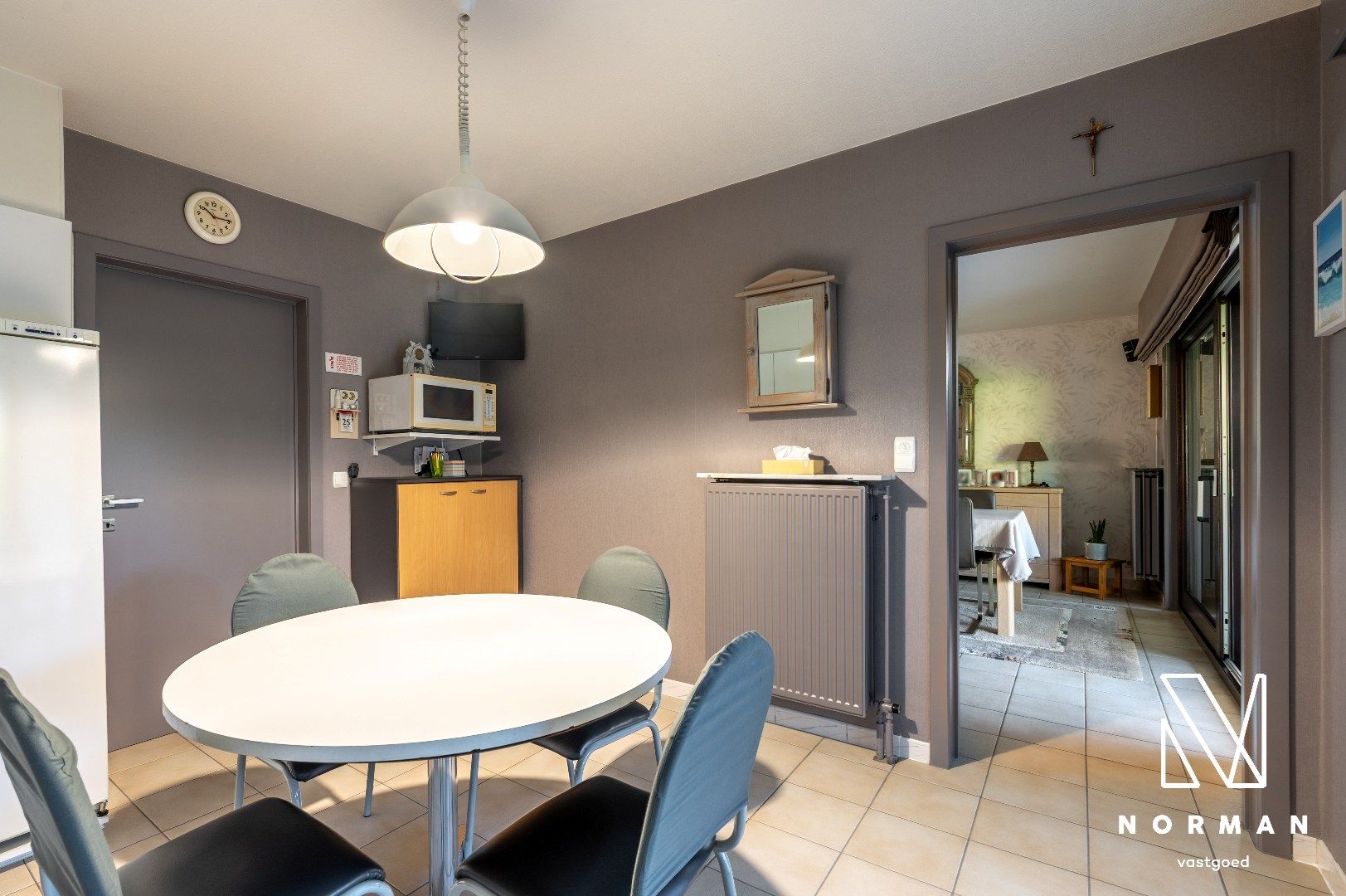 Halfopen woning met 4 slaapkamers en perfecte georiënteerde tuin in doodlopende straat in Kortrijk foto 5