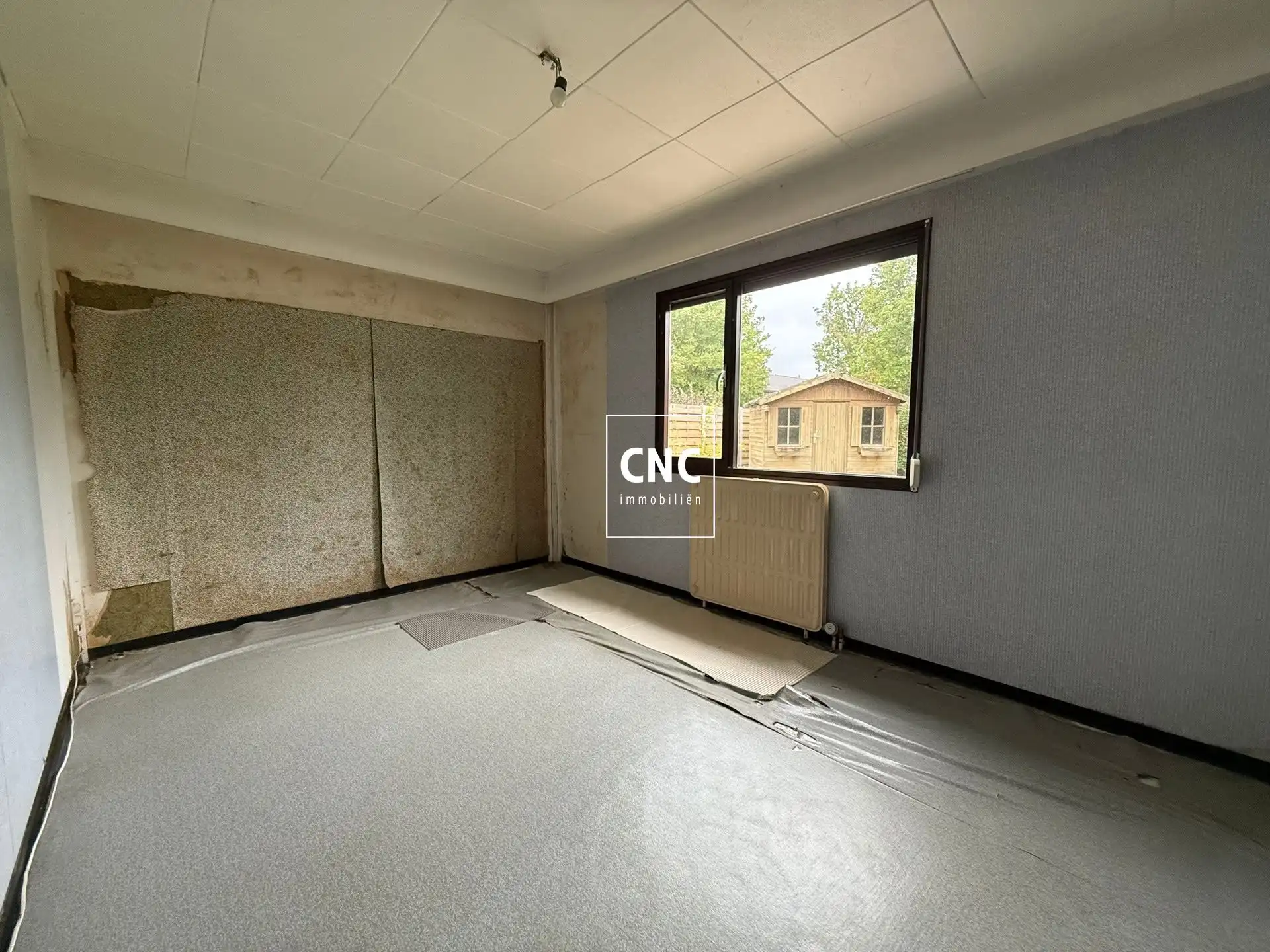 Halfopen bebouwing met 3 slaapkamers en grote tuin foto 6