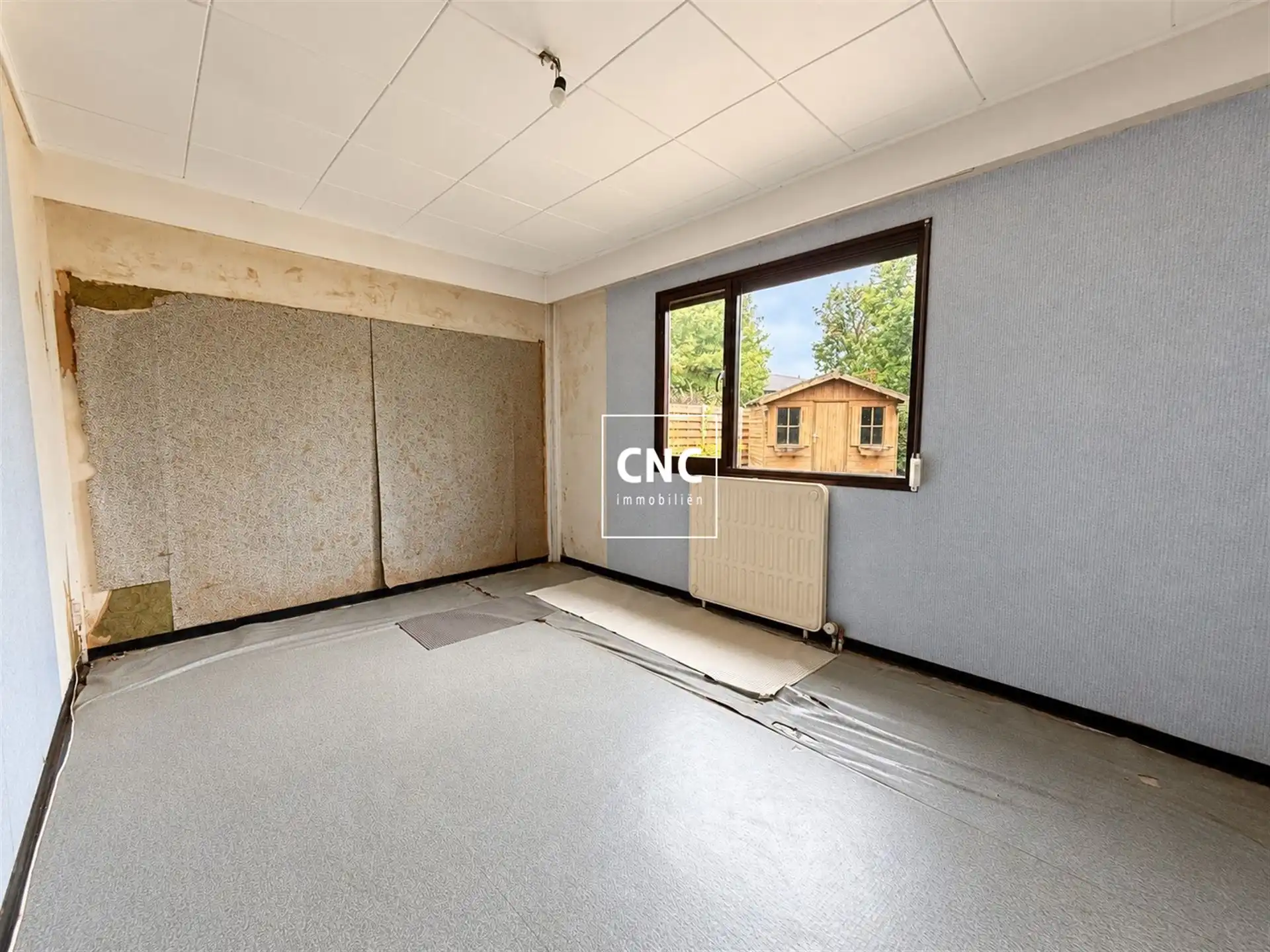 Halfopen bebouwing met 3 slaapkamers en grote tuin foto 6
