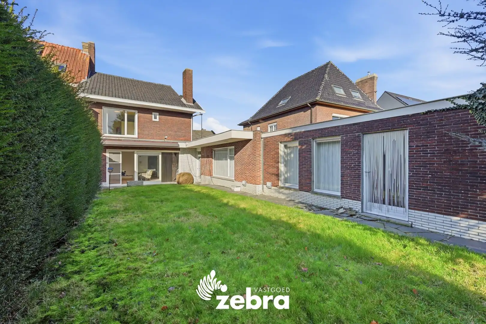 Halfopen bebouwing met praktijk- of kantoorruimte in centrum Tielt foto 27