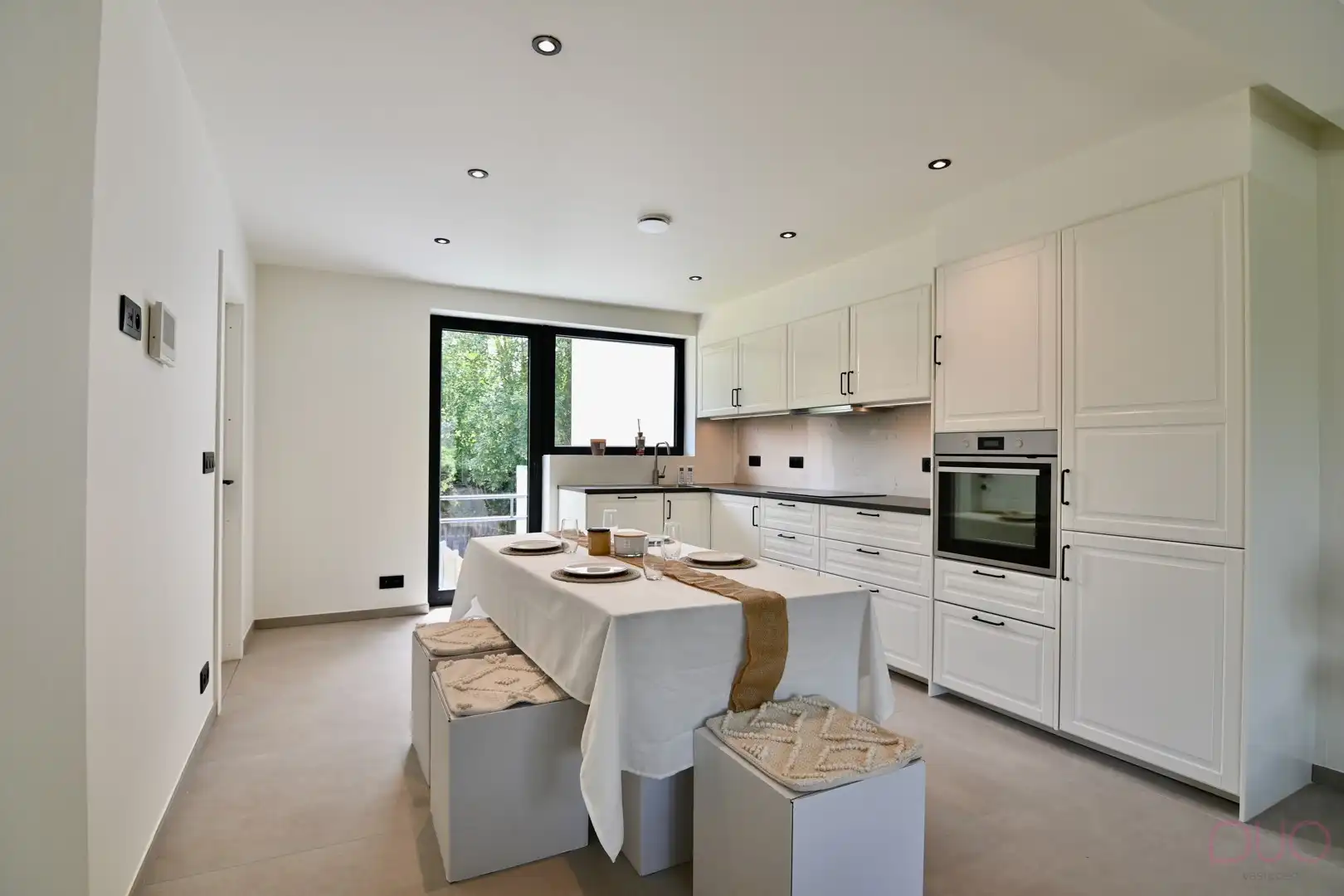 Volledig gerenoveerde woning met garage, terras en tuin - instapklaar afgewerkt! foto 7