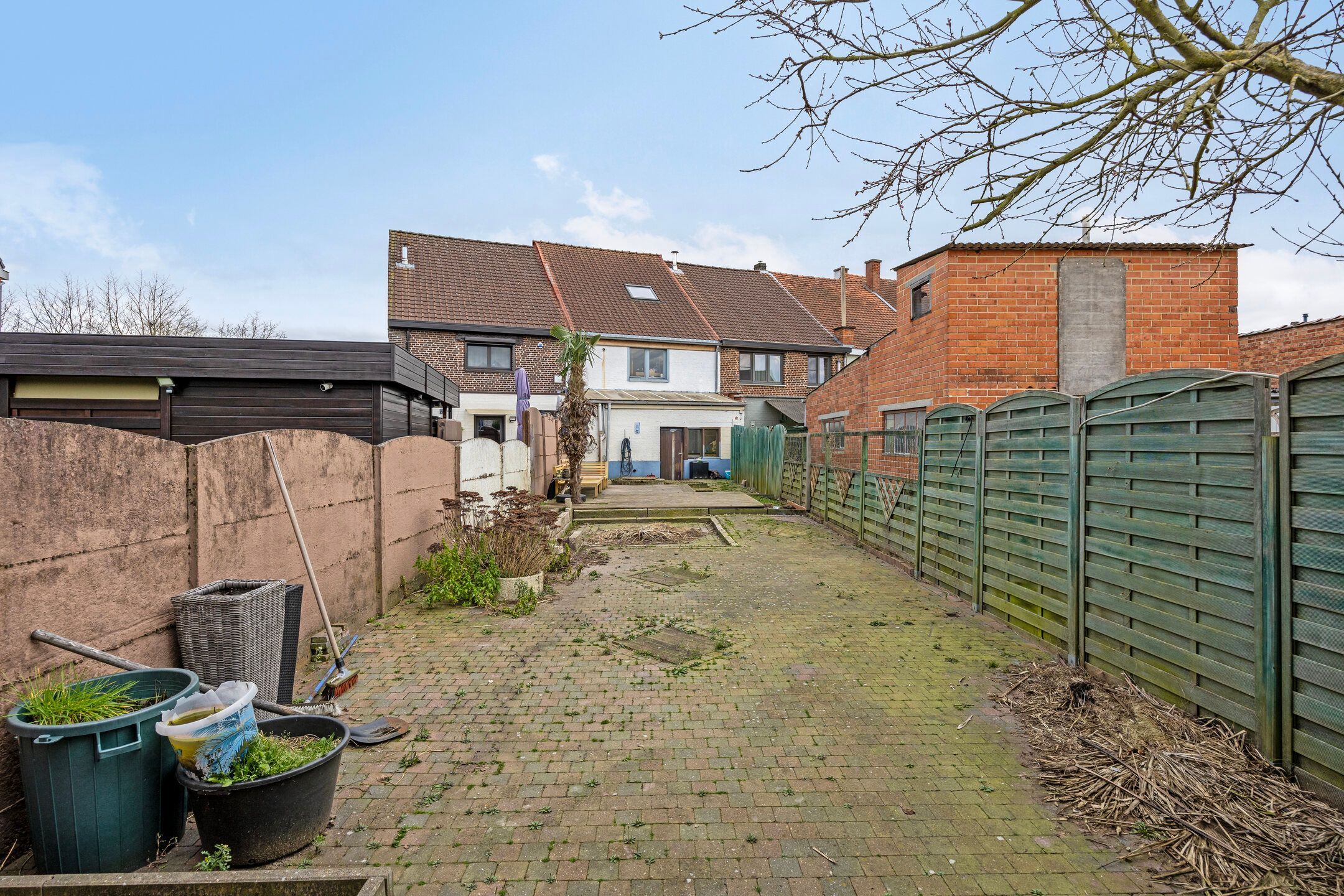 Charmante woning met omheinde tuin en garage foto 22