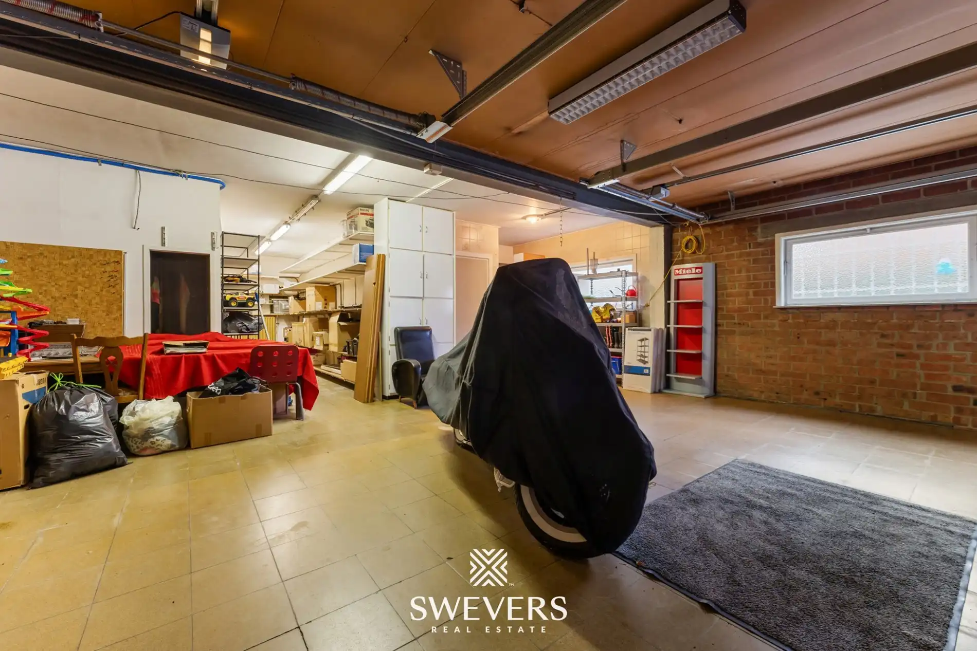 Opbrengsteigendom met handelspand, ruim appartement en uitbreidingspotentieel in hartje Heusden-Zolder foto 46