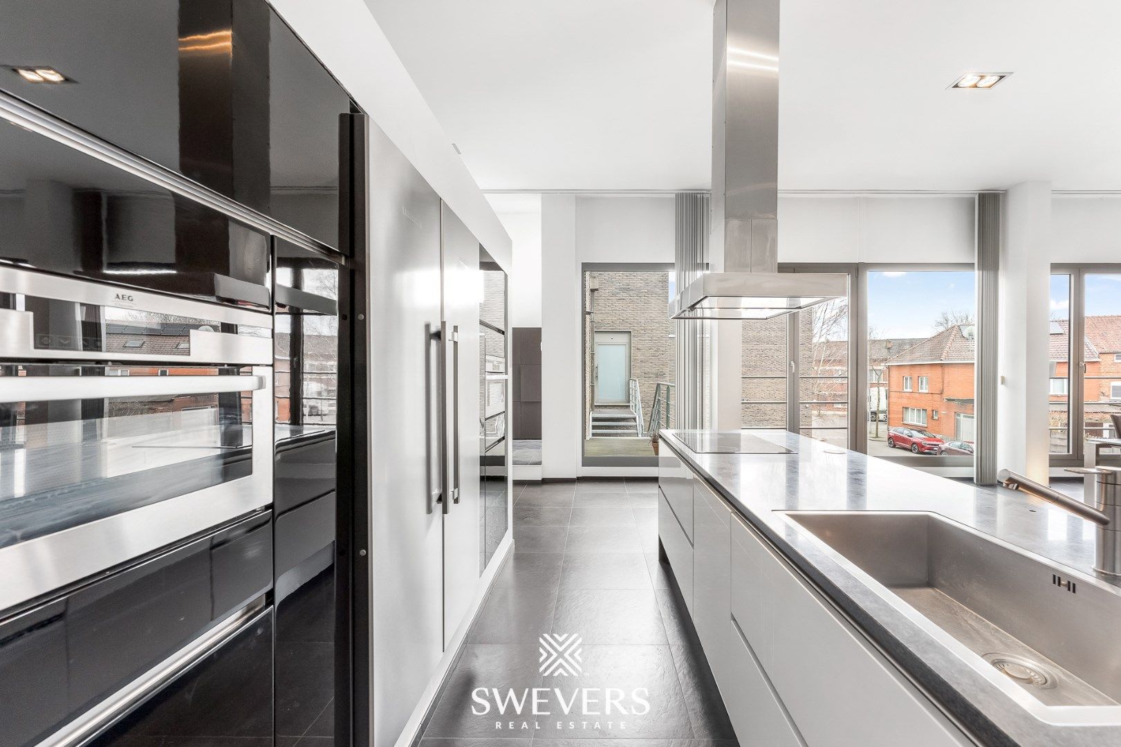 Ruime luxueuze loft met groot dakterras nabij Hasselt centrum ( 164 m2 ) foto 8