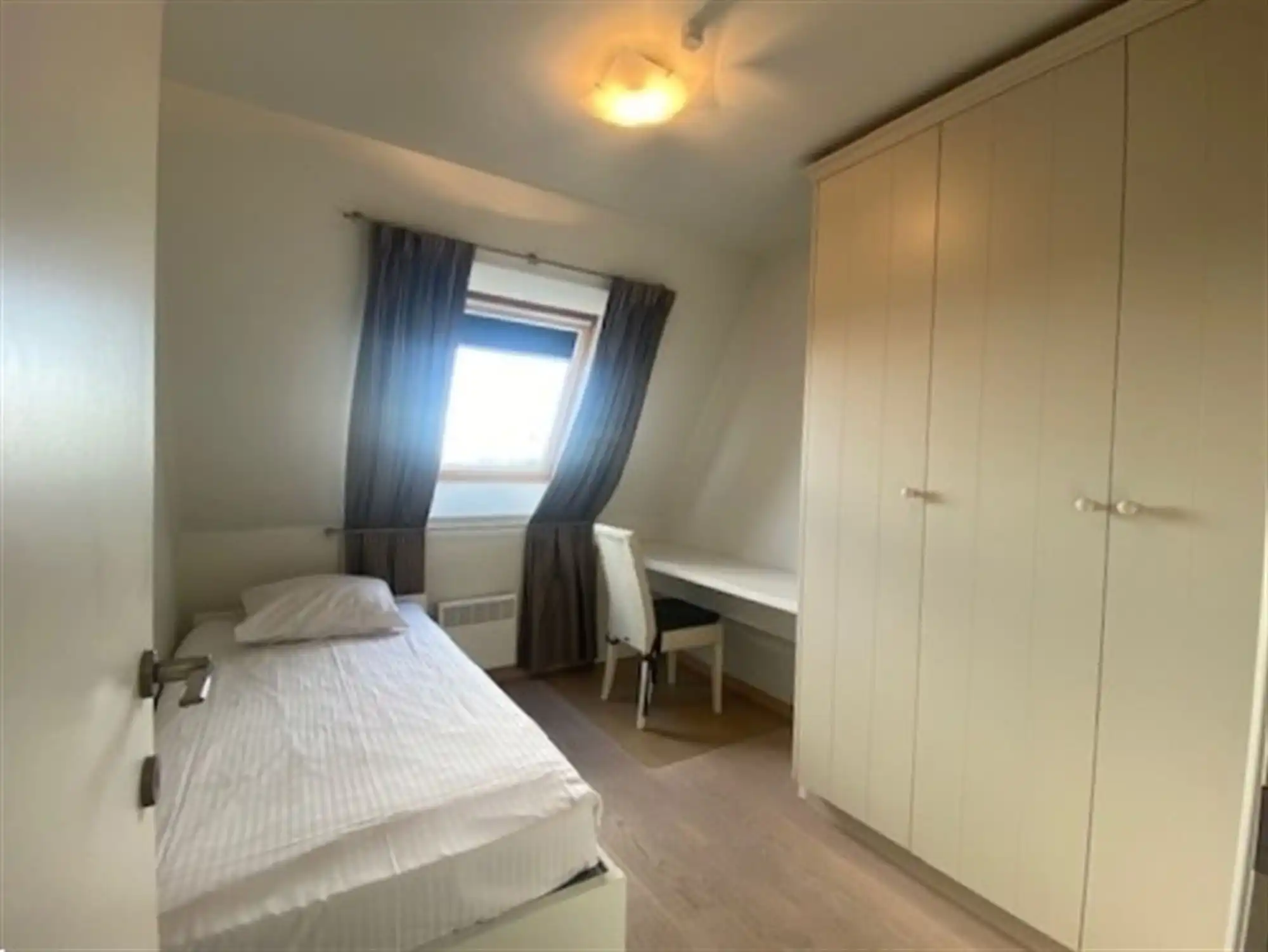 Ruime duplex met 4 slaapkamers en prachtig zicht op duinen en zee foto 11