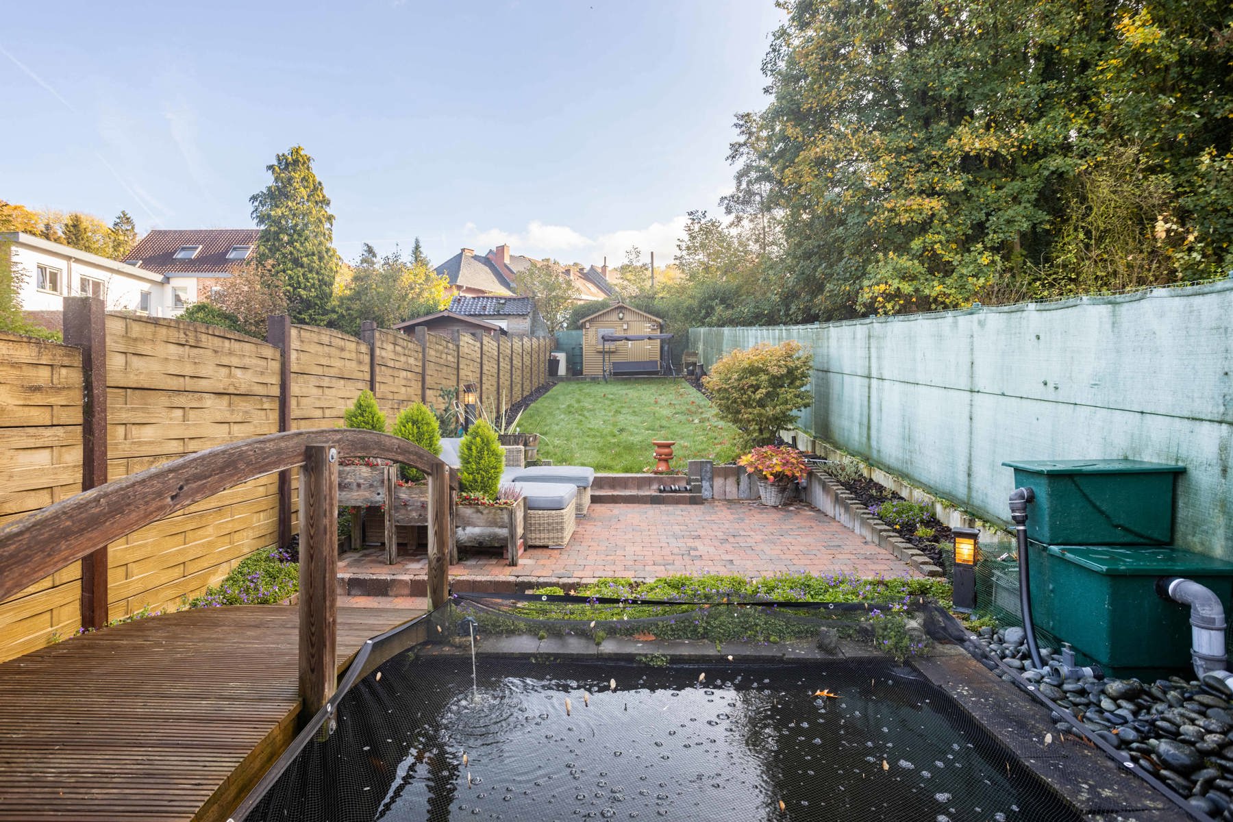 Charmante gezinswoning met 4SLPK en tuin foto 20