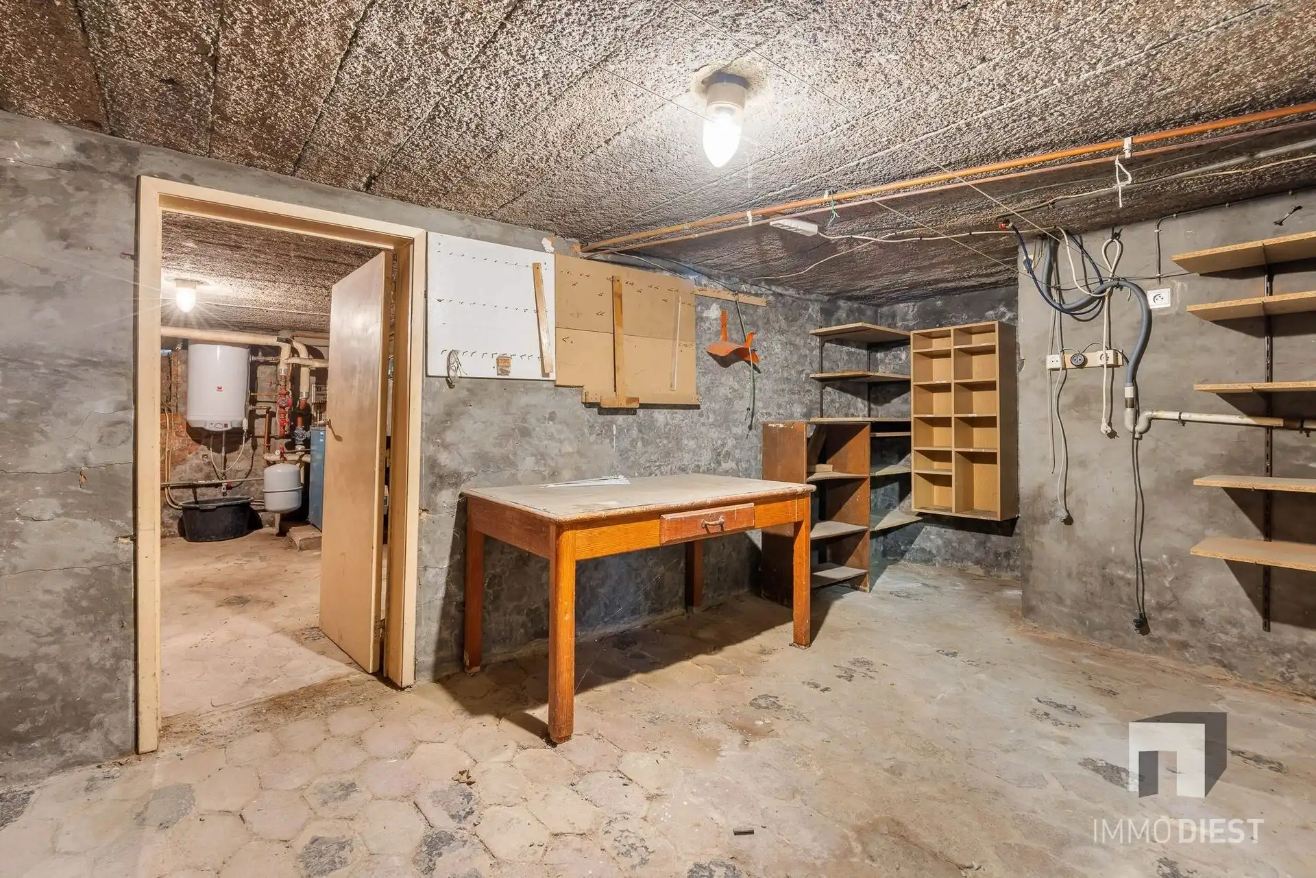 Op te knappen betaalbare split-level woning te Schaffen, kort bij de Bossen van Hees foto 6