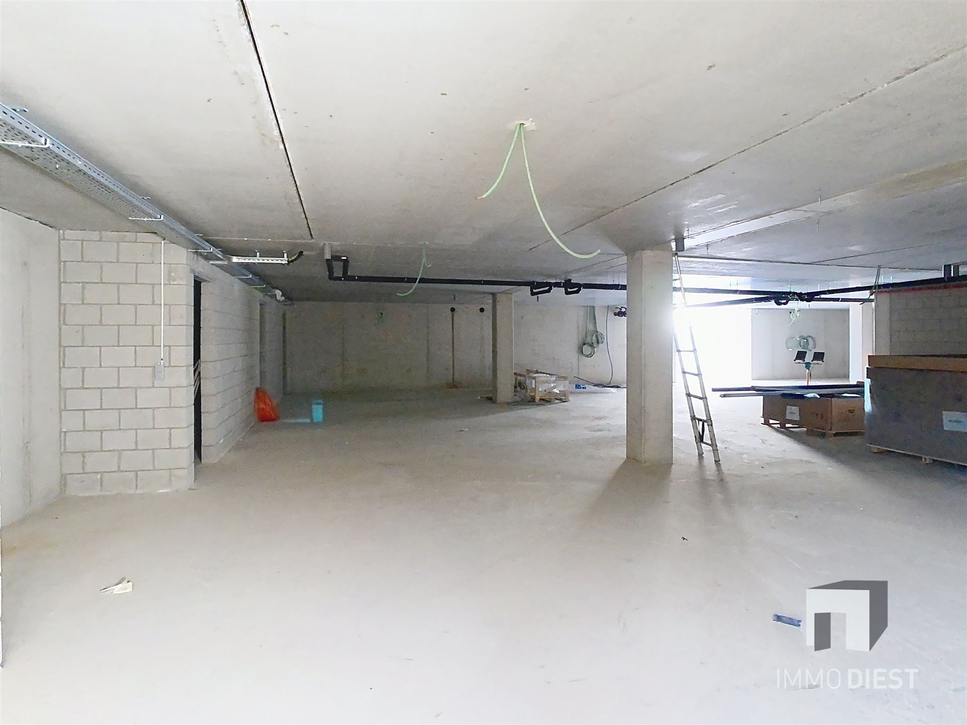 Gelijkvloers appartement met terras en tuintje foto 17