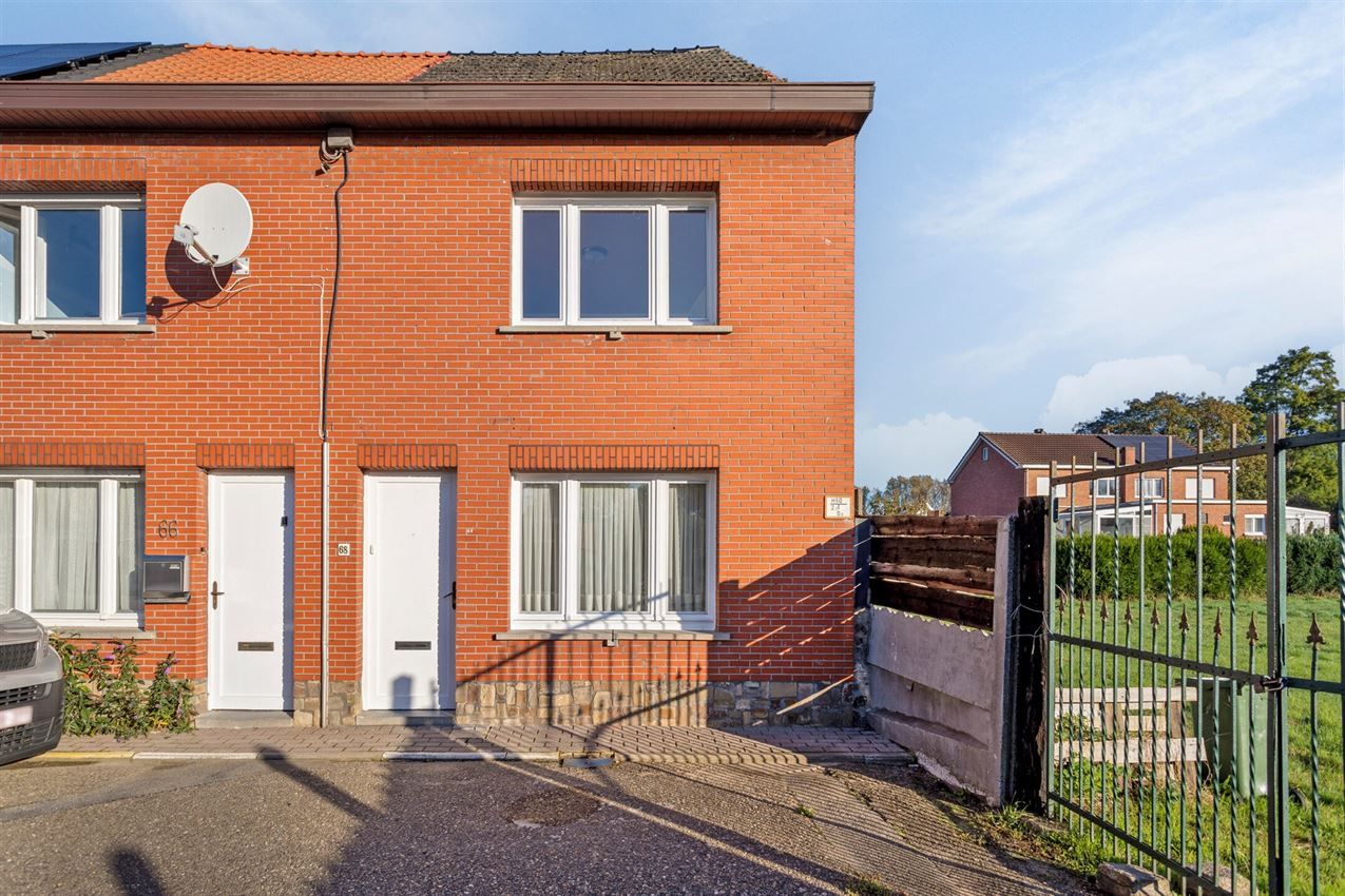 Charmevolle woning met 2 slpk., koer en garage foto 1