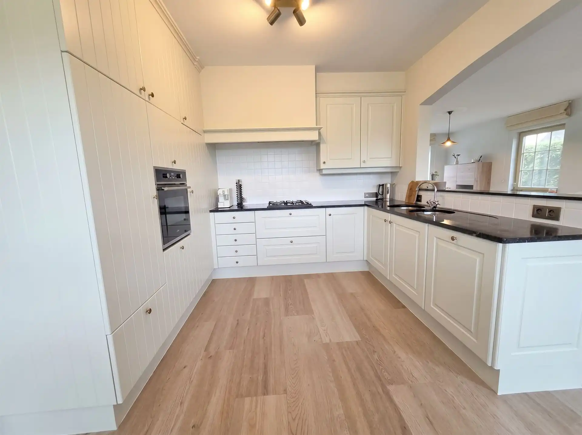 Rustig gelegen pastorijwoning met prachtige tuin in Booischot foto 6