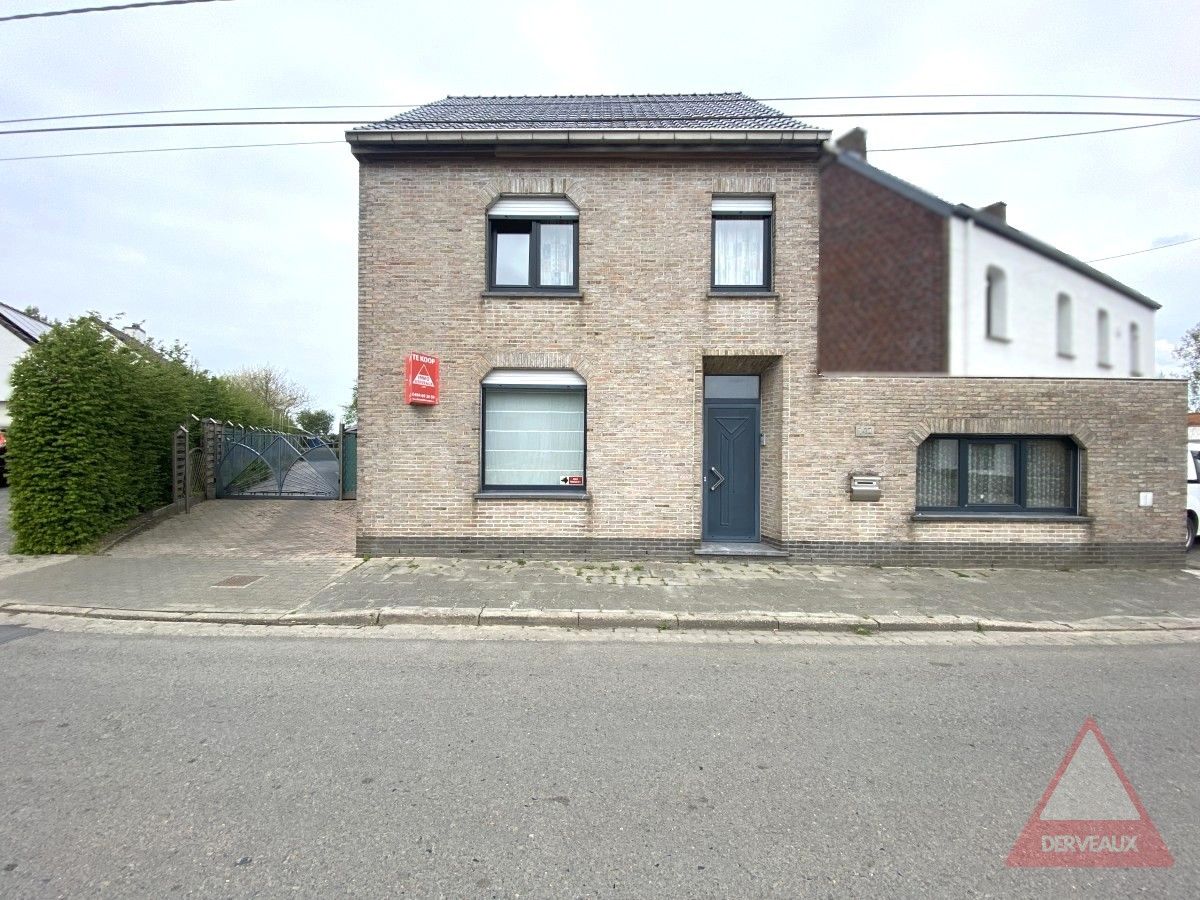 Hooglede – Open woning met loods, dubbele garage en lift op centrale ligging foto {{pictureIndex}}