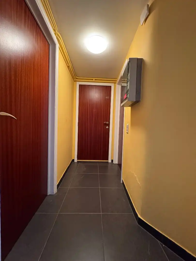 Ruim hoekappartement met garage foto 8