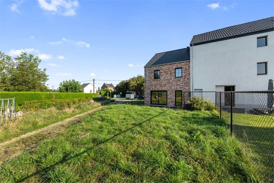 VOLLEDIG AFGEWERKTE HALFOPEN NIEUWBOUWWONING IN PASTORIJSTIJL IN WAASMONT foto 6