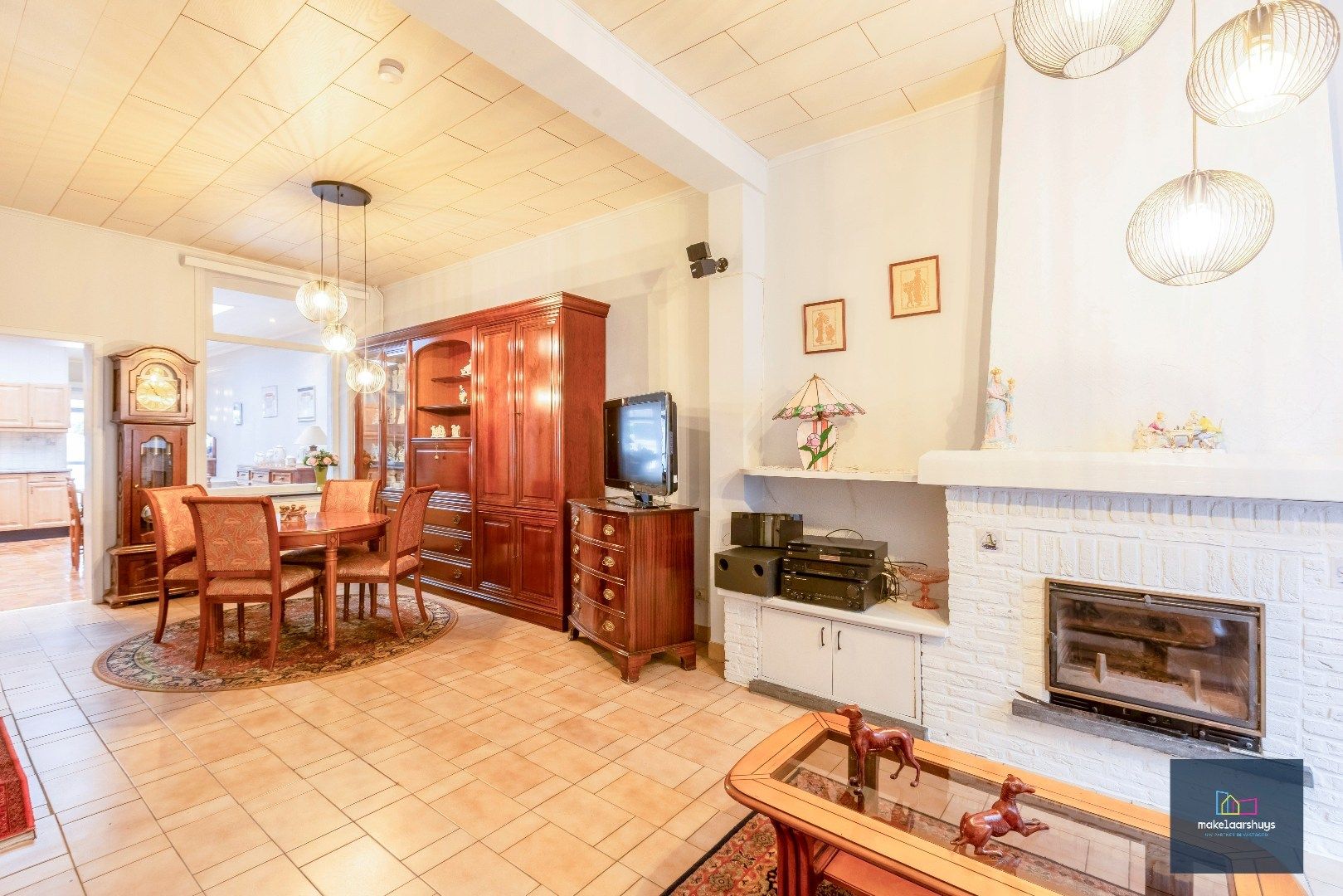 Charmante op te frissen rijwoning met ruime stadstuin  foto 3