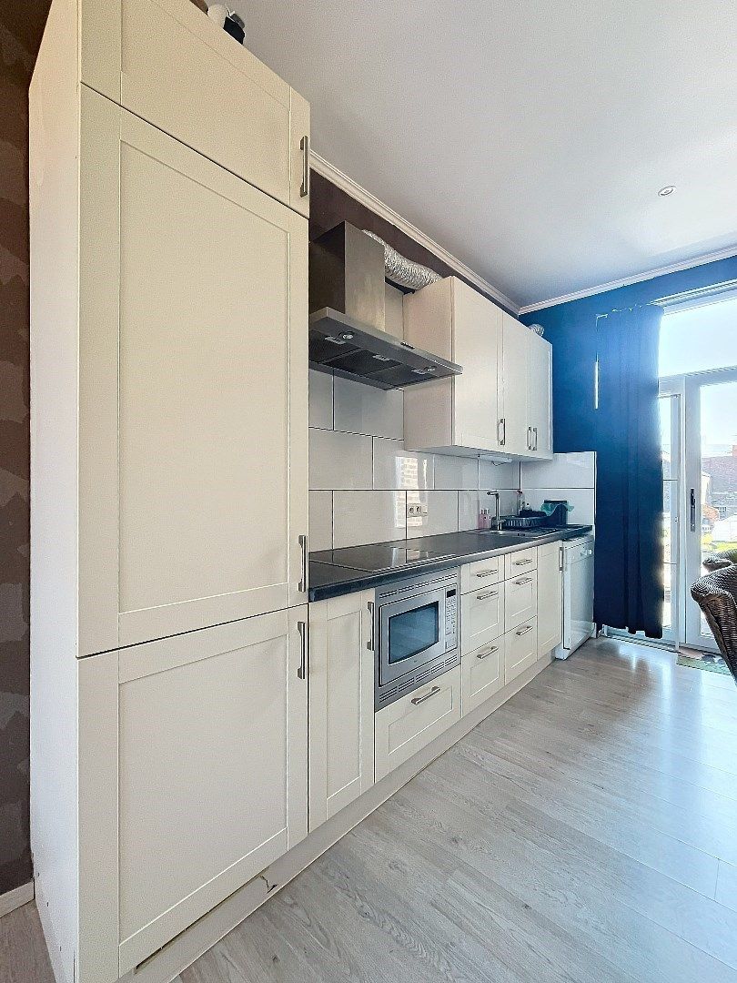 Unieke ruime stadswoning met verzorgde tuin, garage en 4 slaapkamers in Tienen. foto 6