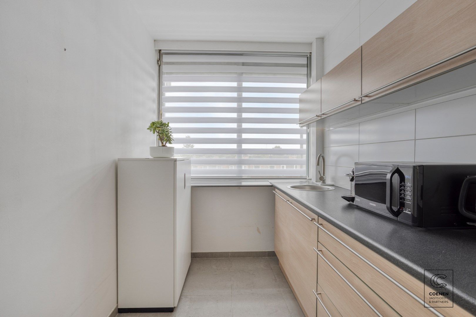 Instapklaar appartement met 2 slpk's nabij het centrum van Schoten foto 7