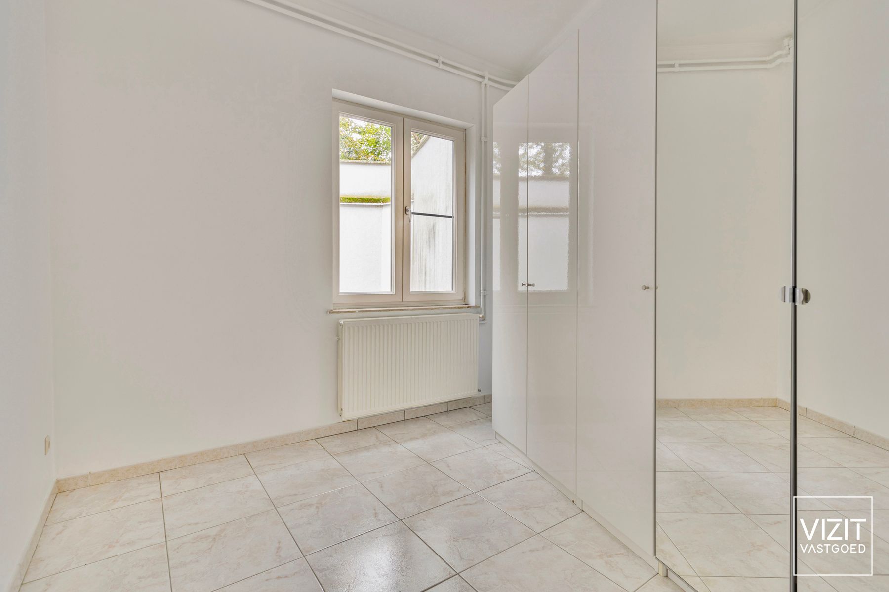 Gelijkvloers appartement met ruime koer te centrum Ninove foto 11
