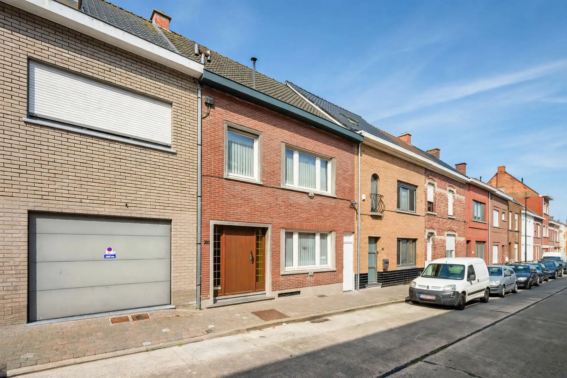 Degelijke woning met veel potentieel & aangename tuin  foto 2