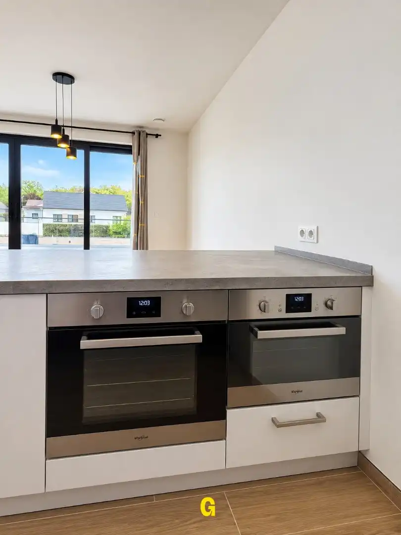 Nieuwbouwappartement met 2 slaapkamers, ruim terras, standplaats en berging te Munsterbilzen - Label A foto 14