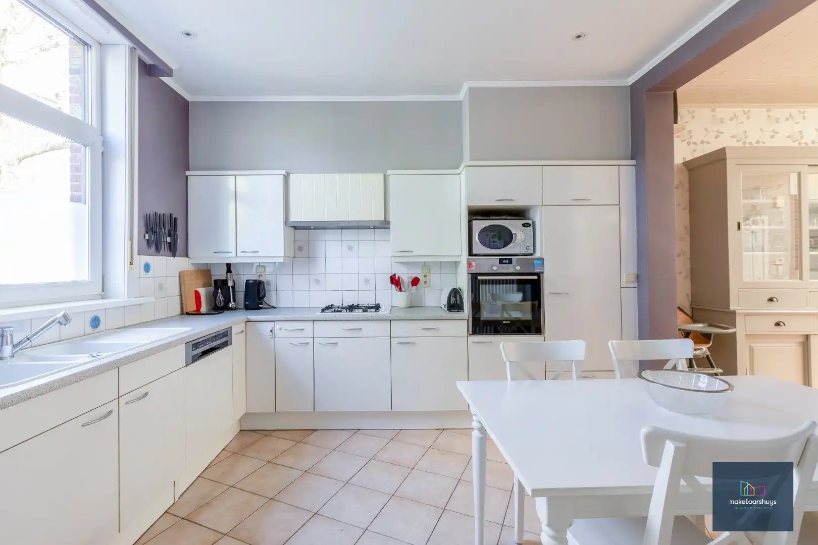 Ruime en instapklare gezinswoning met 4 slaapkamers en stadstuin  foto 2