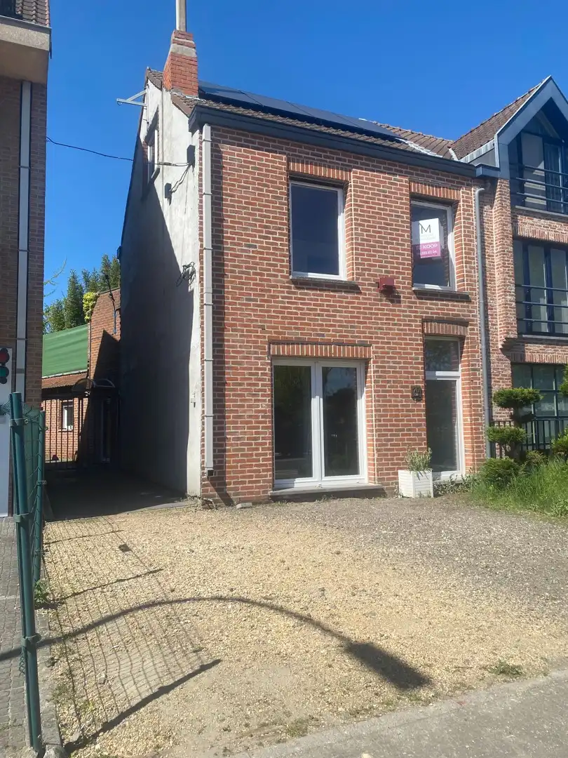 Centraal gelegen te renoveren woning met ruime garage en achterliggende tuin foto 22