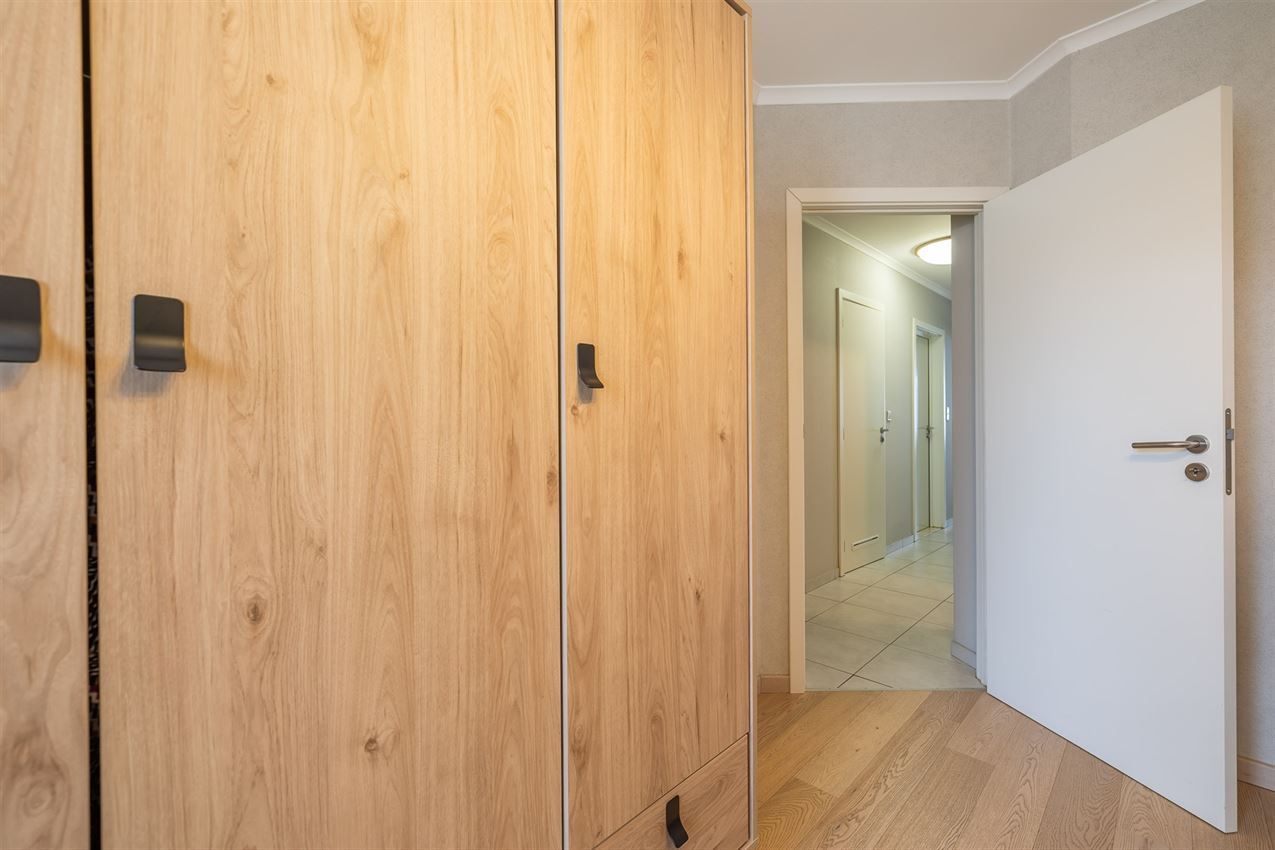 Verzorgd gebouw met handelszaak en 2 apt foto 55