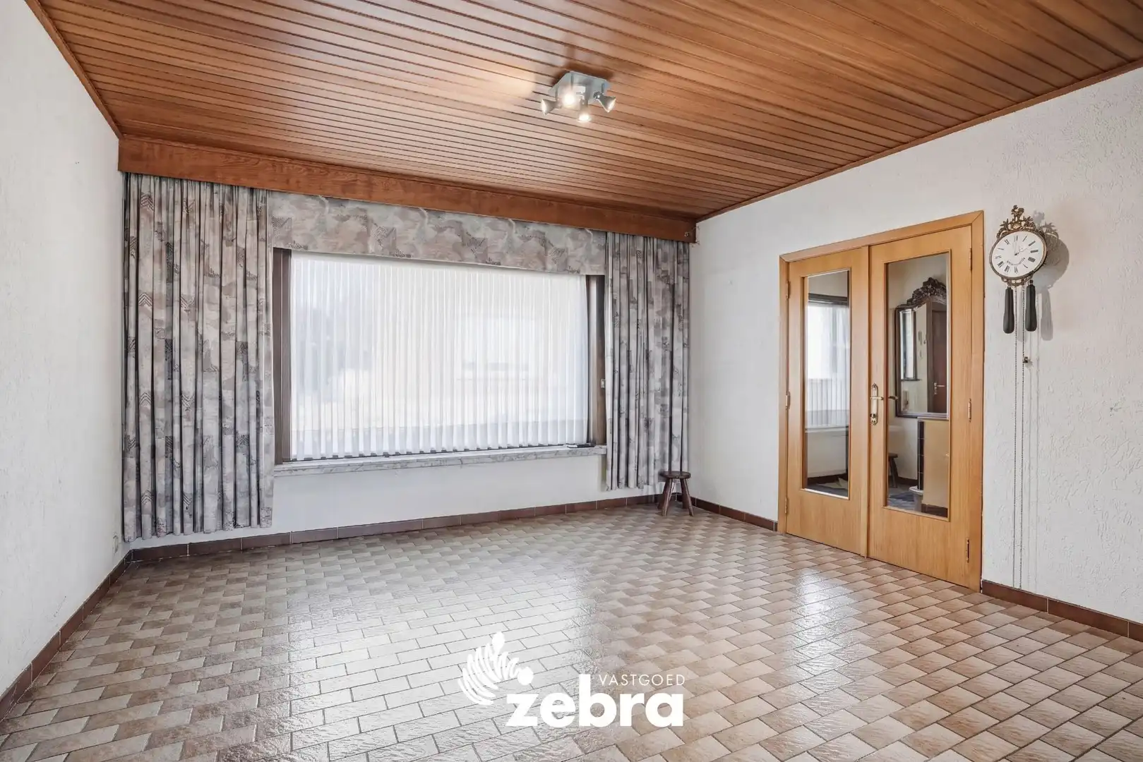 Op te frissen woning met veel potentieel, tuin en garage nabij het centrum van Tielt! foto 4