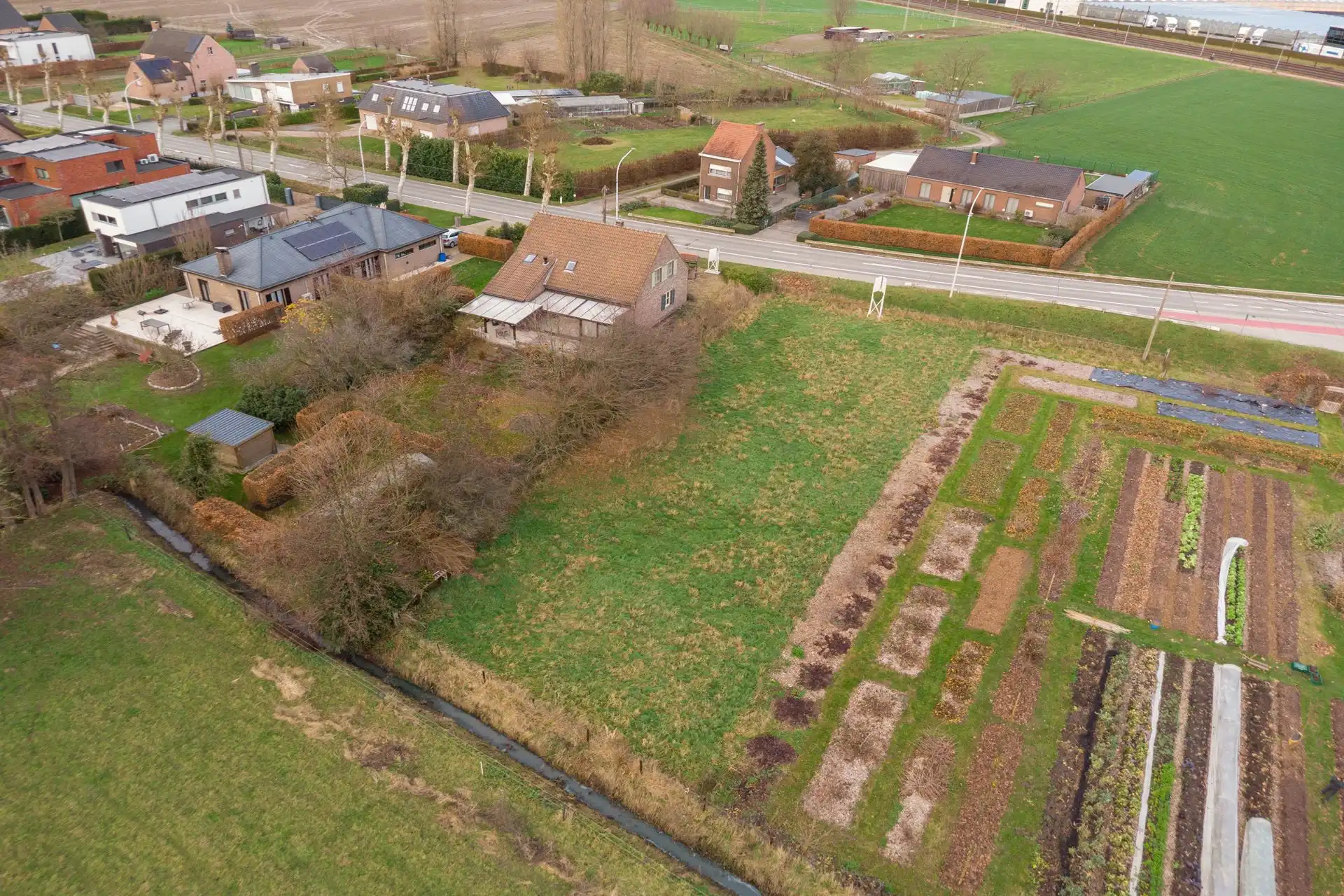 Perceel villagrond van 1083m2 & ZUID-tuin foto 8