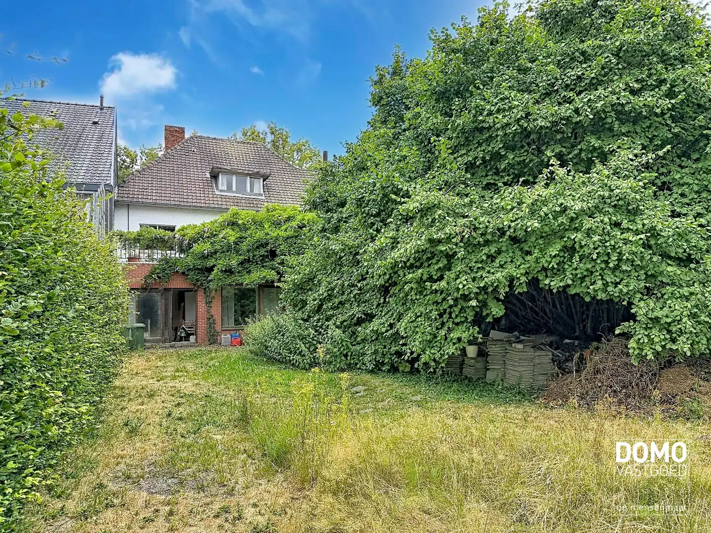 KARAKTERVOLLE RENOVATIEWONING MET 259 M² BEWOONBARE OPPERVLAKTE EN DIEPE WESTGERICHTE TUIN foto 5