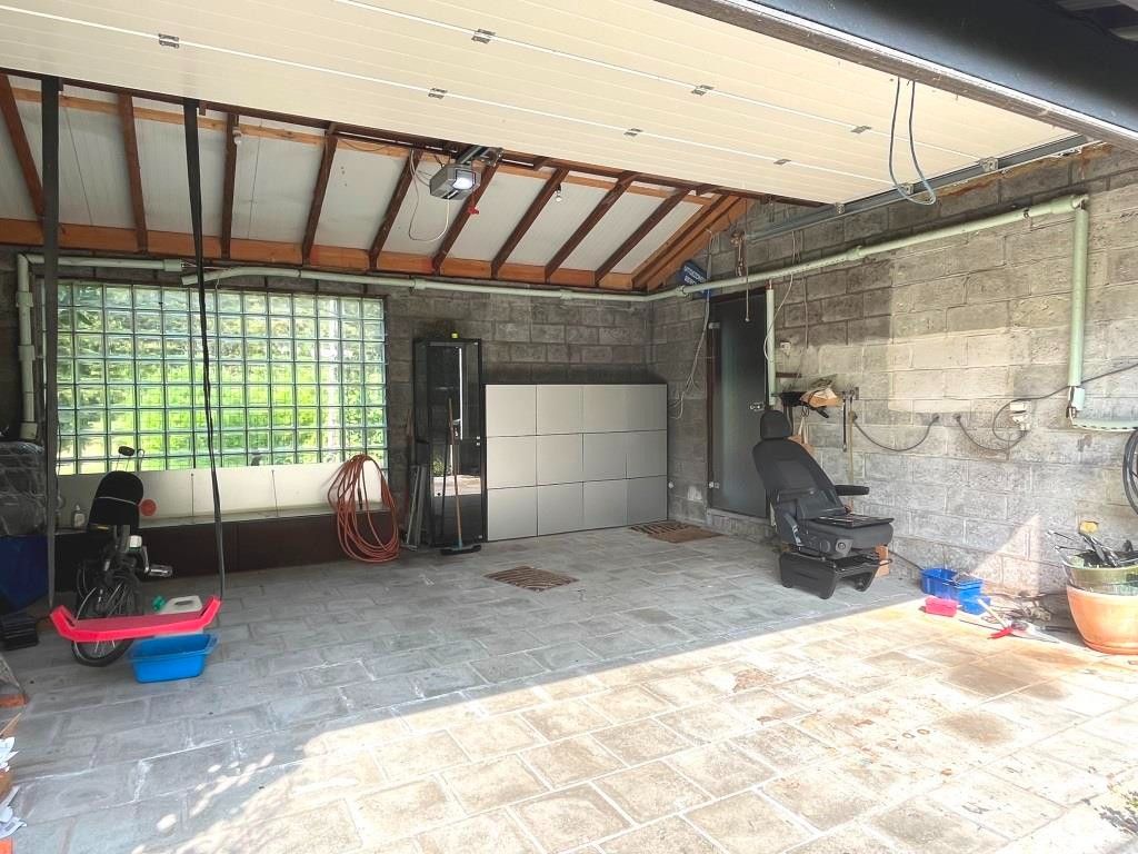 Volledig te verbouwen/slopen woning met 3 slaapkamers, inpandige garage, tuin en garagebox op een perceel van 1.154m² foto 7