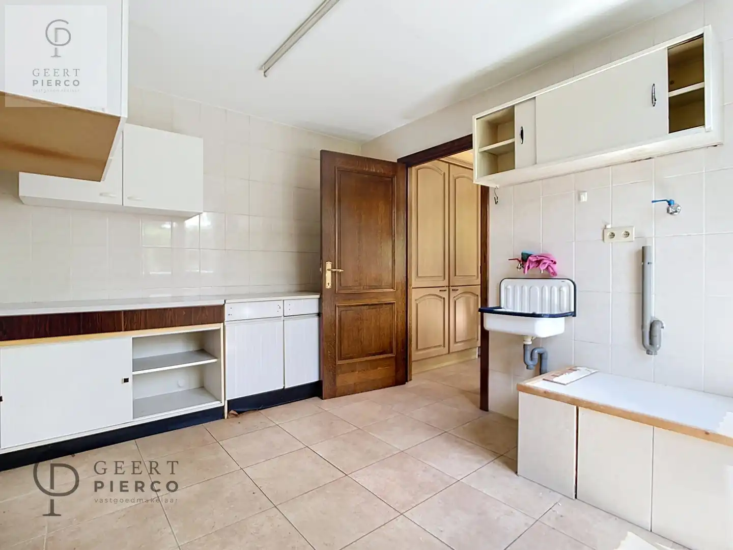 Instapklaar gelijkvloers appartement met garagebox en tuin in Landen foto 11