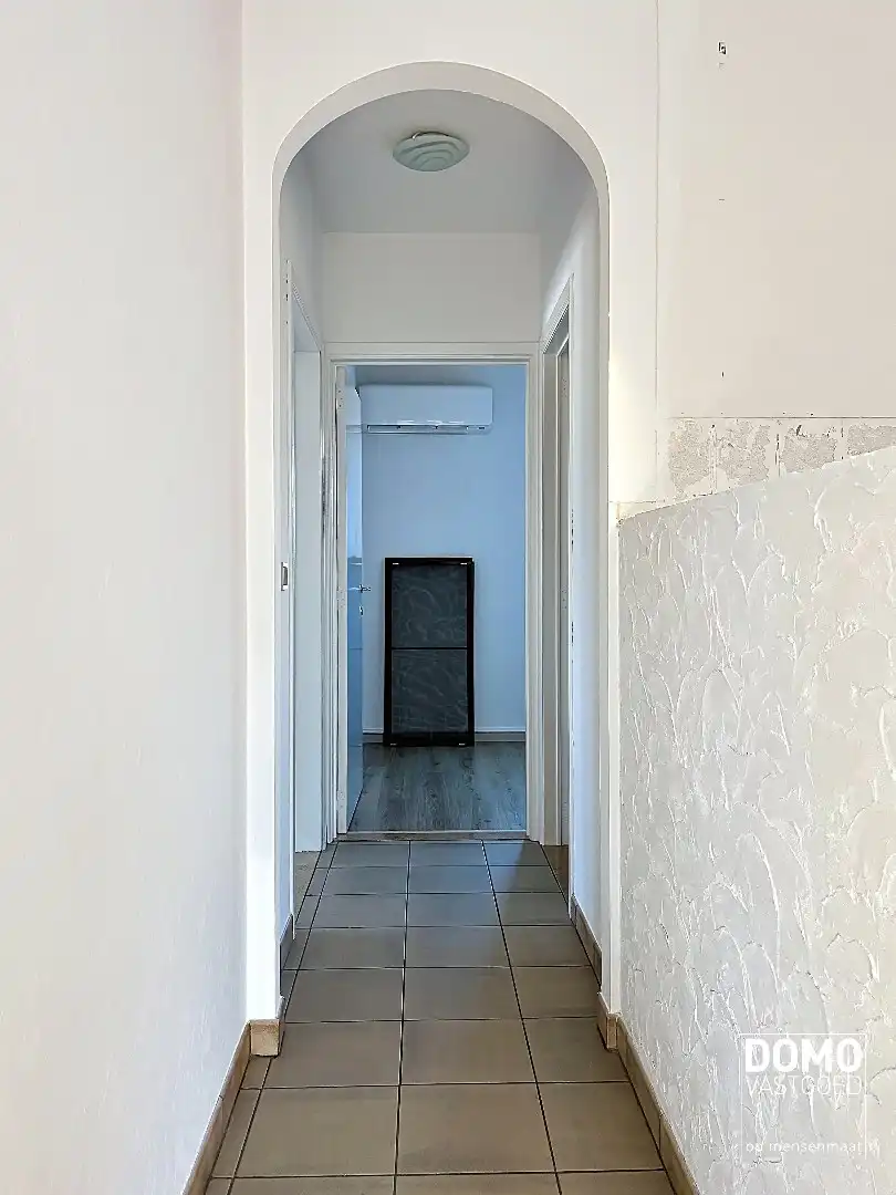 LICHTRIJK APPARTEMENT MET 2 SLAAPKAMERS EN GARAGEBOX foto 8