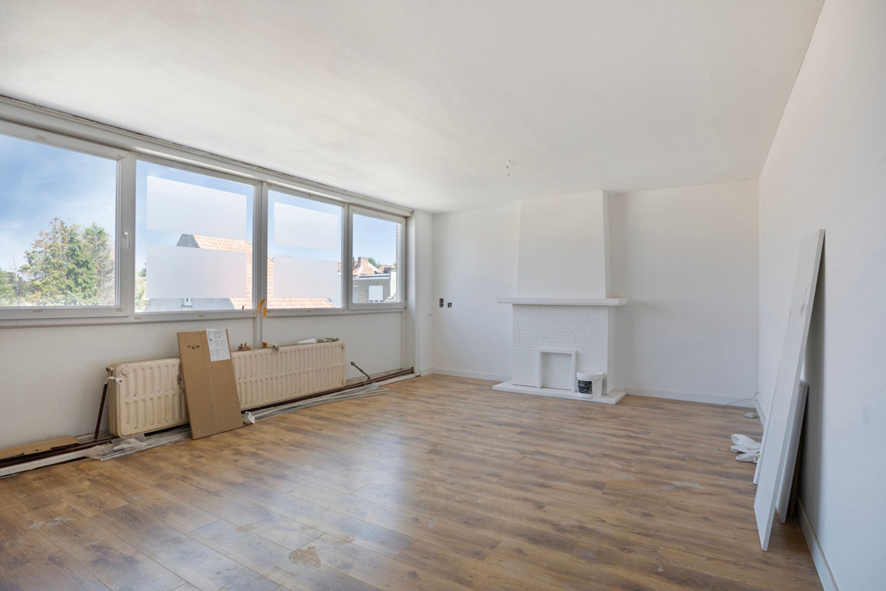 TE KOOP: Opbrengsteigendom met 3 appartementen en garage foto 4