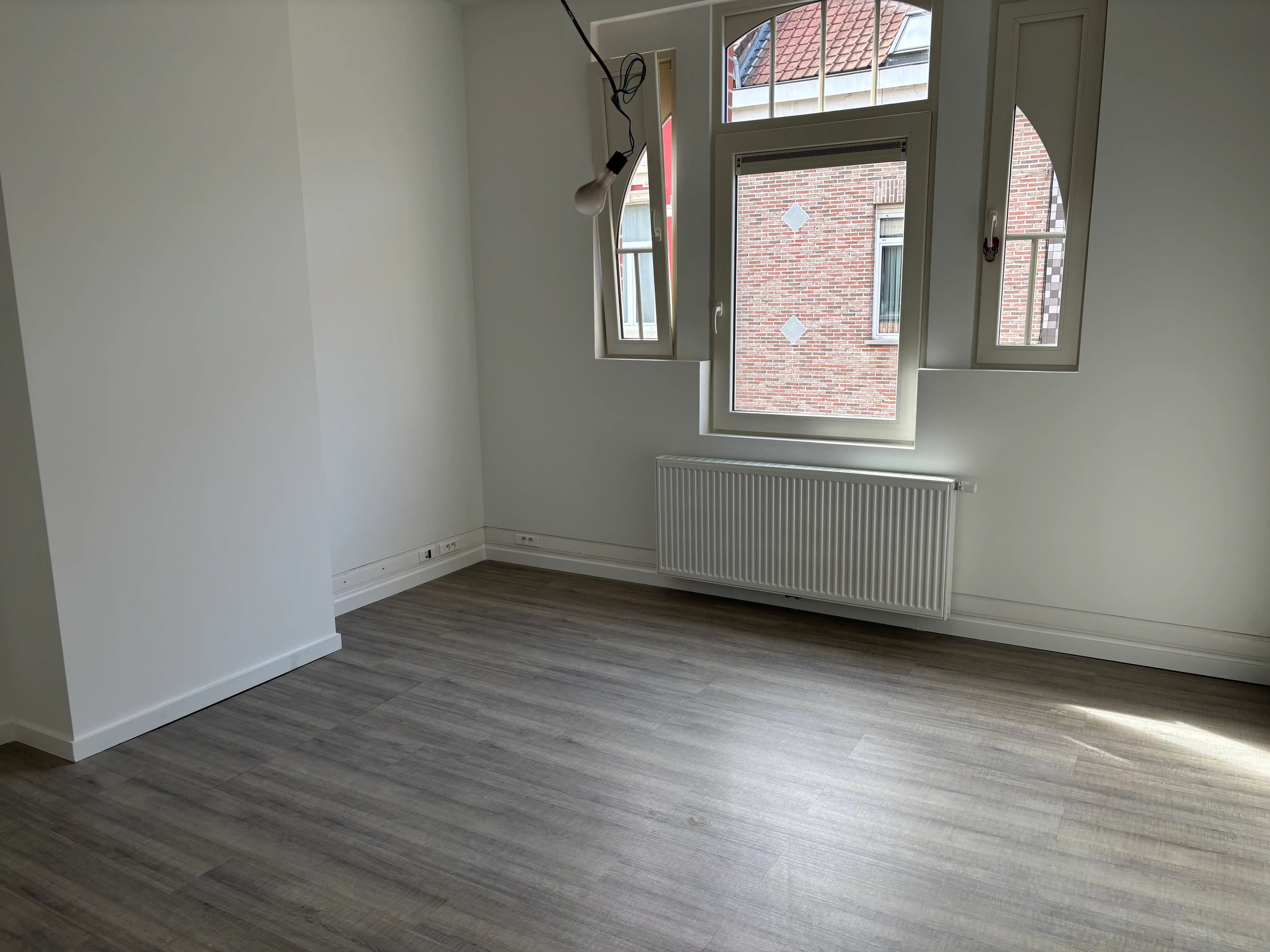 Gezellige rijwoning 4 slaapkamers + garage en stadstuin foto 13