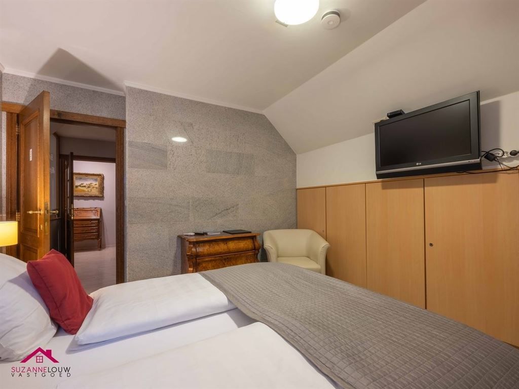 Vrijstaande villawoning / hotel met 8 slaapgelegenheden foto 47