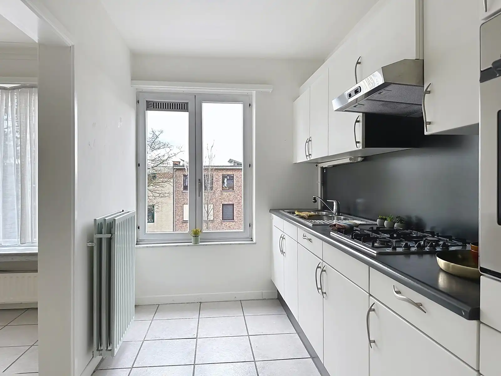 Centraal gelegen appartement met garage en staanplaats foto 17